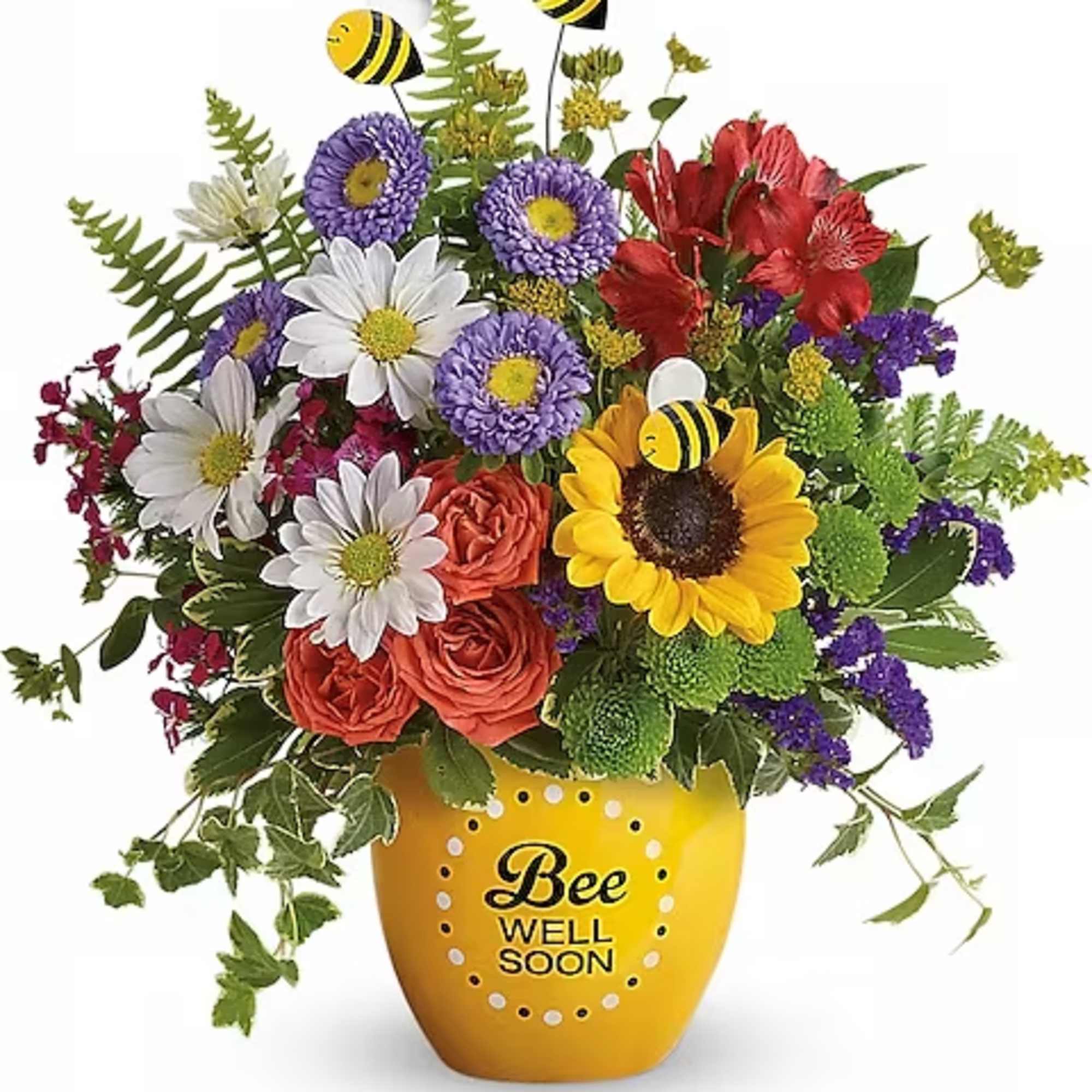Mixed bouquet in a yellow vase with bee decorations