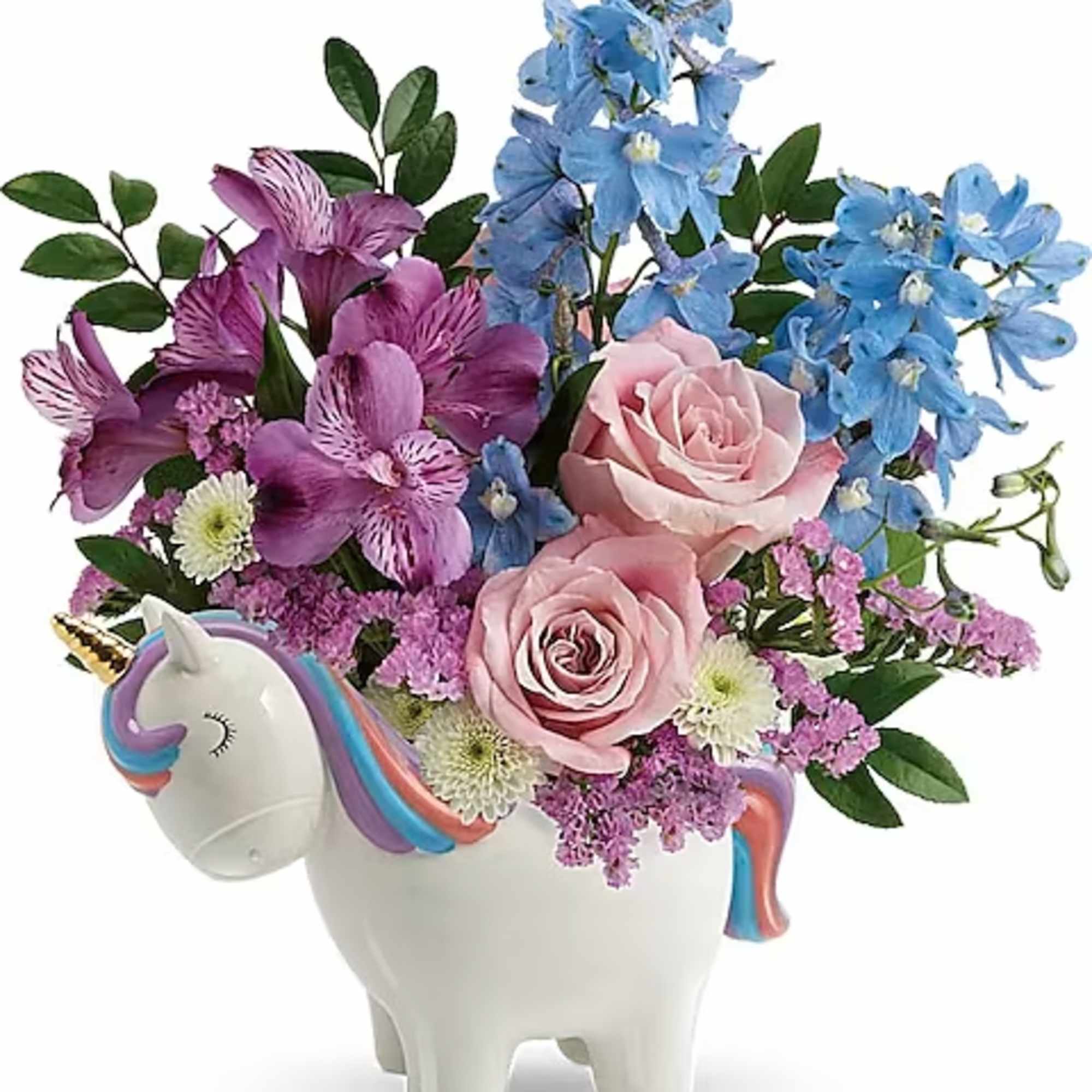 Pink and blue flowers arranged in a unicorn-shaped ceramic container