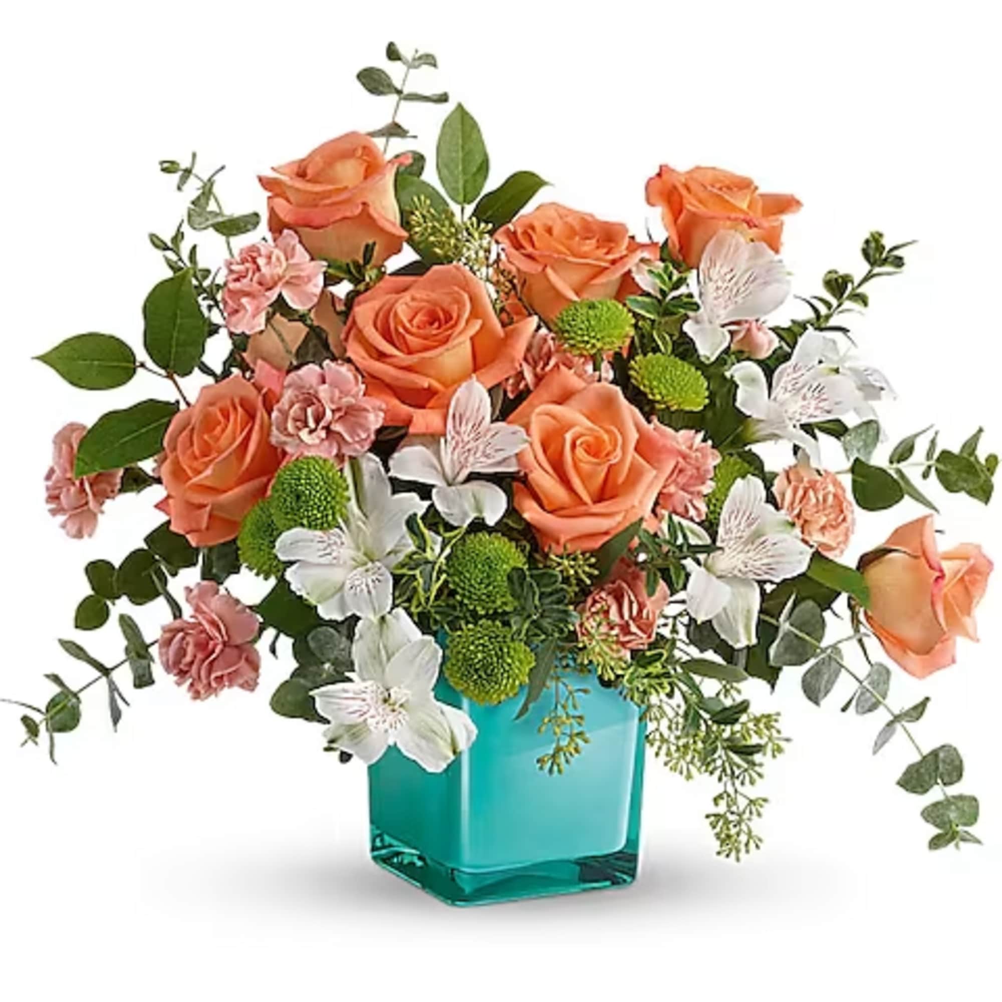 Peach roses and white alstroemeria in a turquoise vase