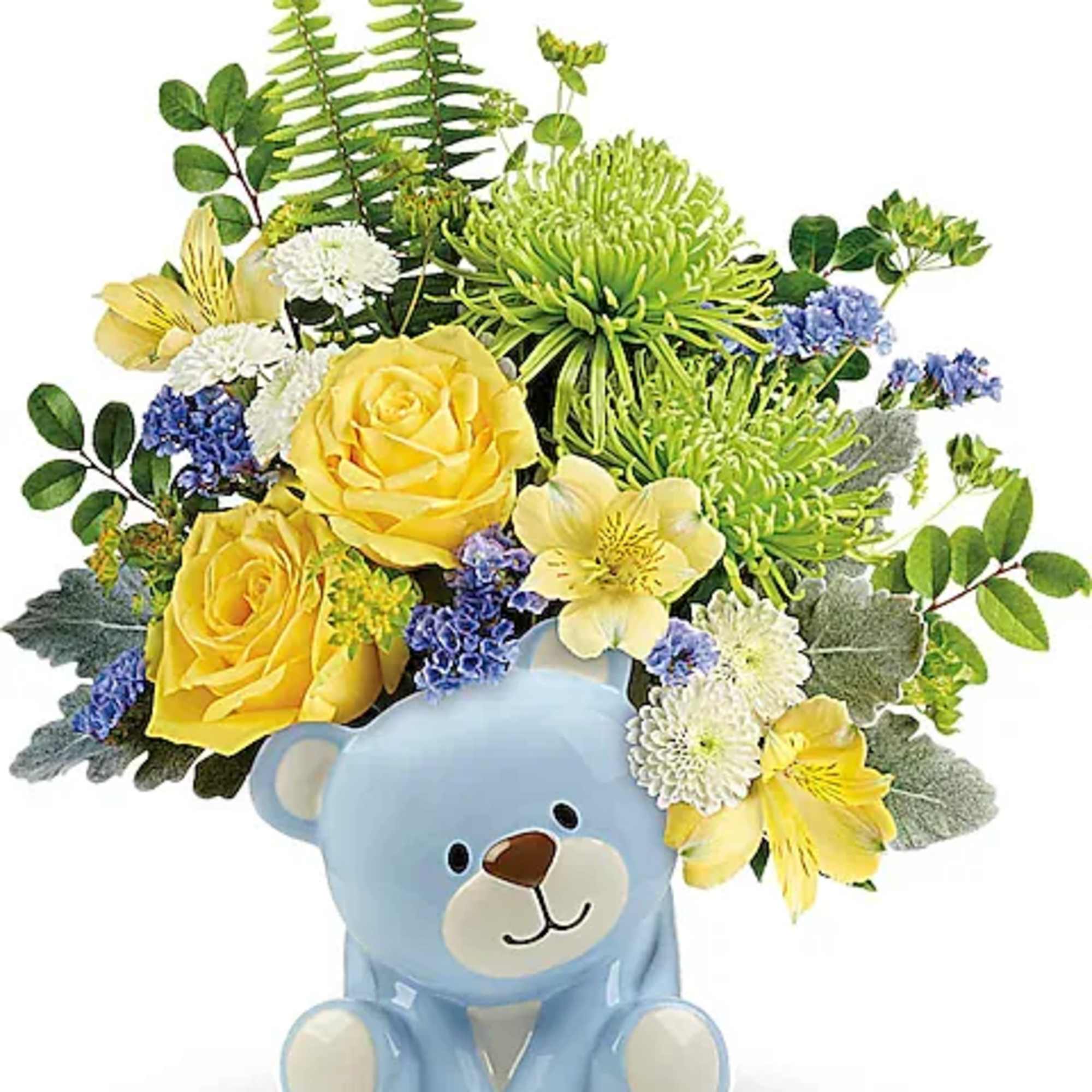 Yellow and white flower arrangement in a blue teddy bear container