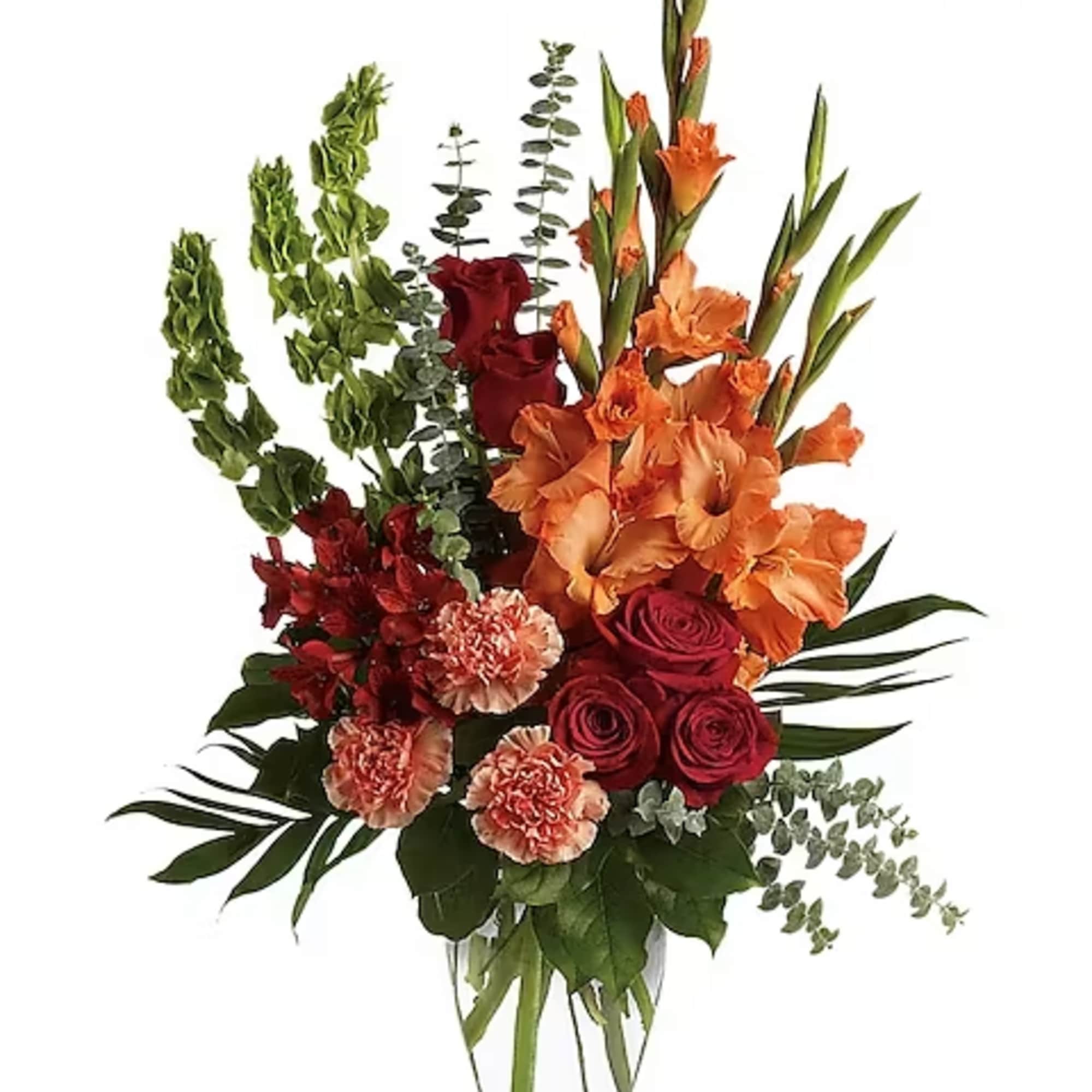 Tall bouquet of orange gladiolus, red roses, and pink carnations in a clear vase