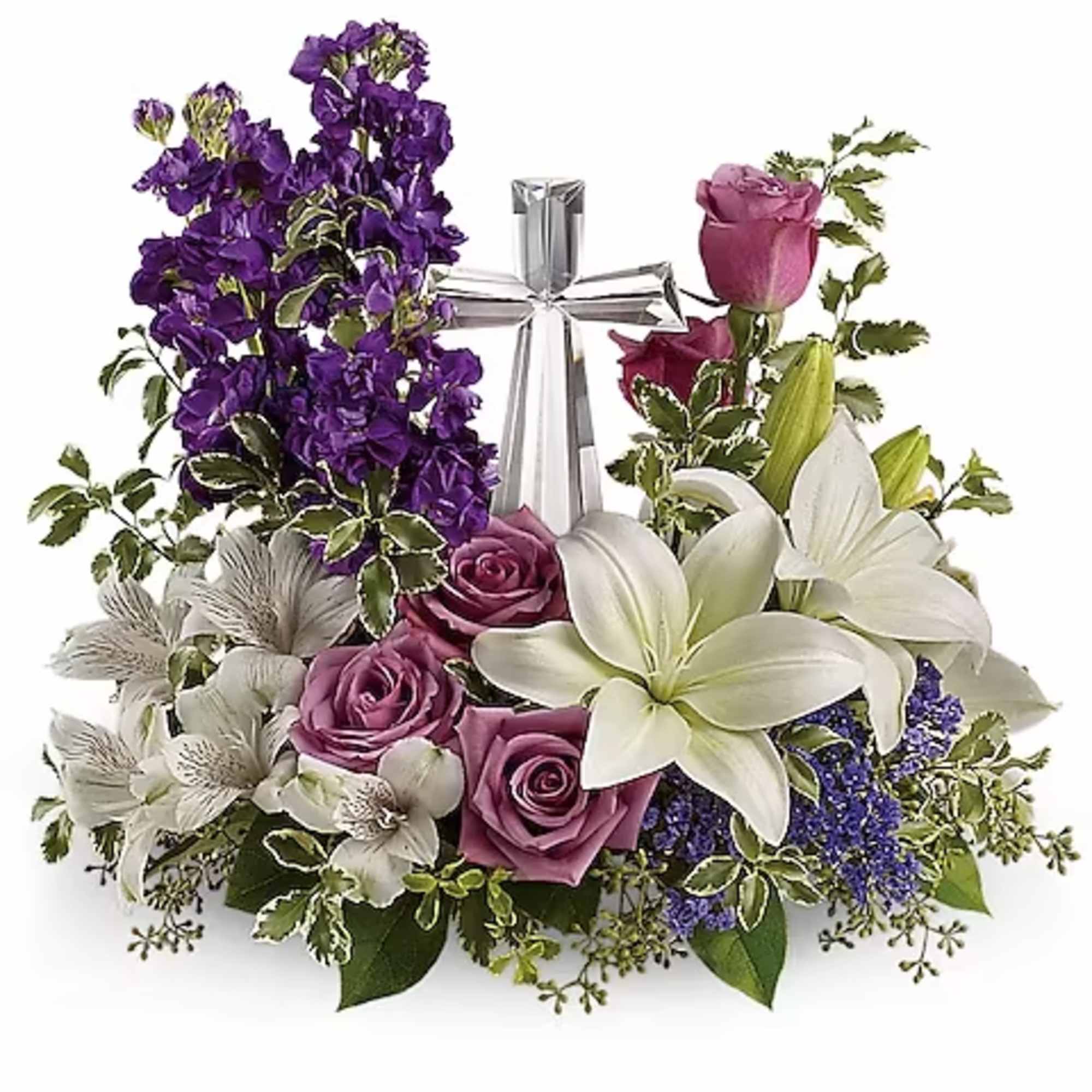 Purple and white floral arrangement with roses and lilies around a silver ribbon