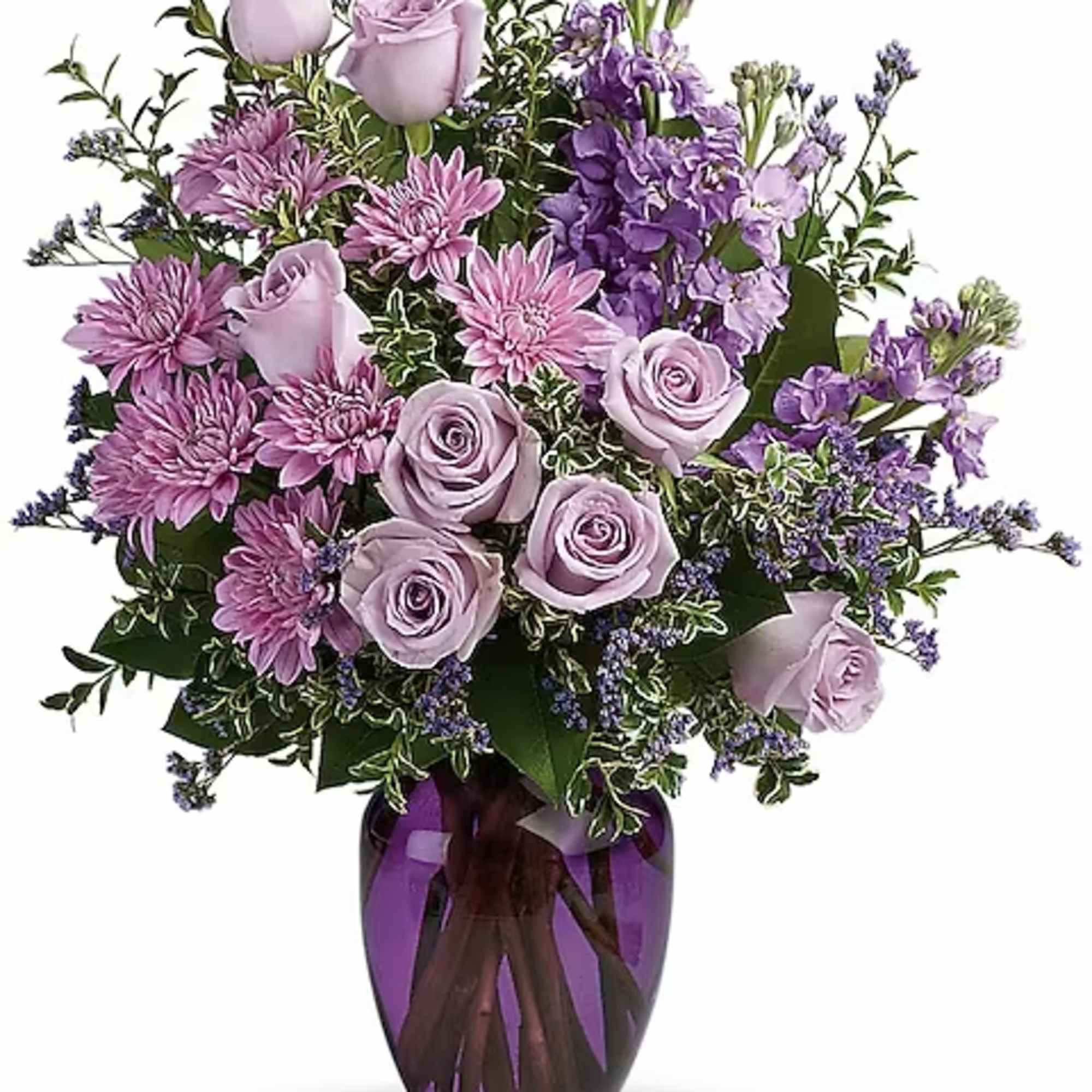 Lavender roses and purple flowers in a purple glass vase
