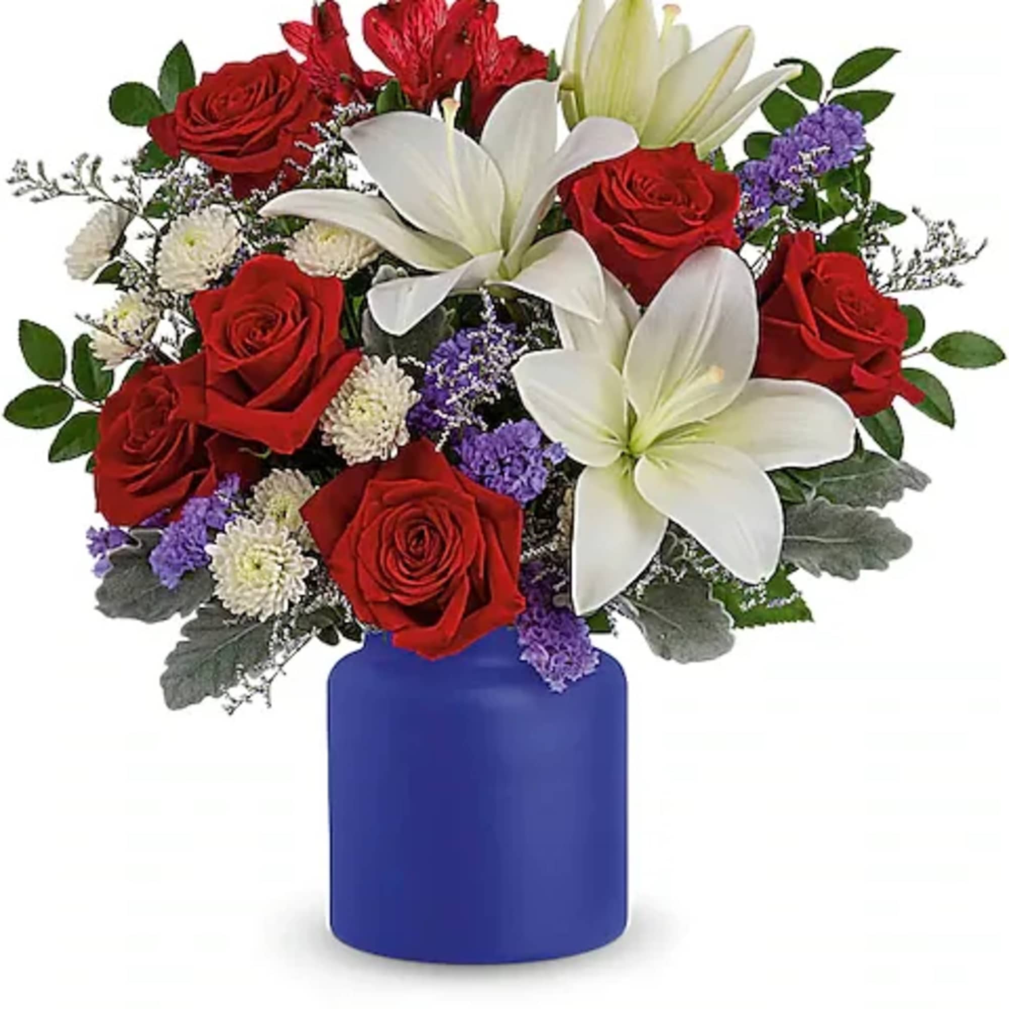 Bouquet of red roses and white lilies in a blue vase
