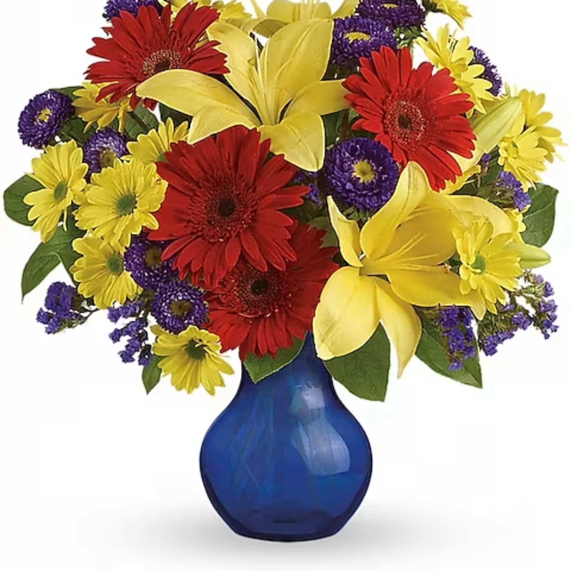 Colorful bouquet of daisies and lilies in a blue vase