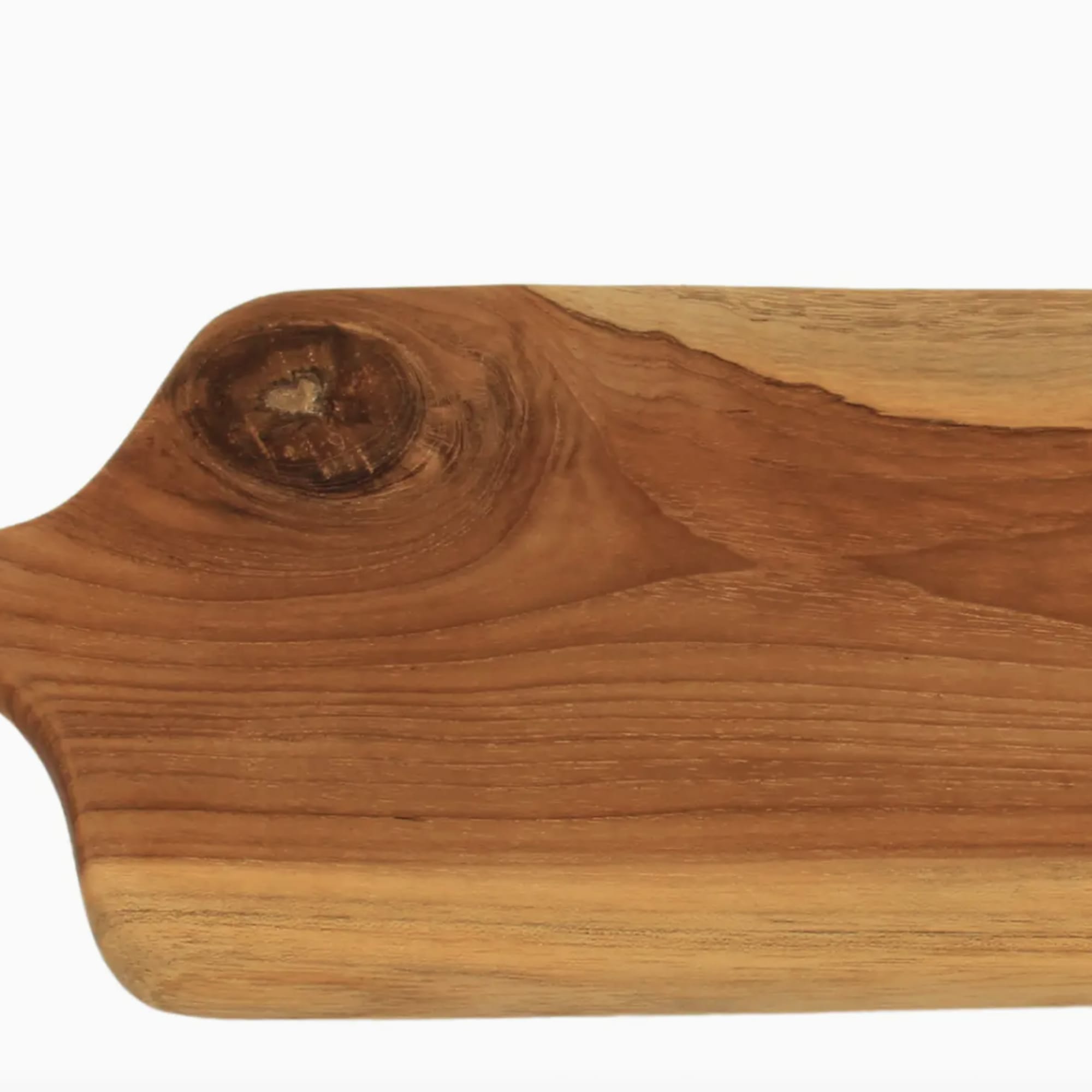 Wooden serving board with a rounded handle and natural grain