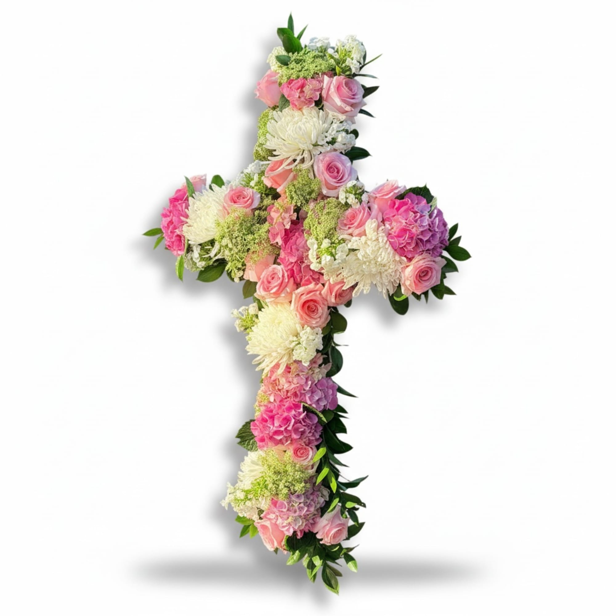 A graceful floral cross featuring soft pink roses, white chrysanthemums, and delicate, photo 2 of 2