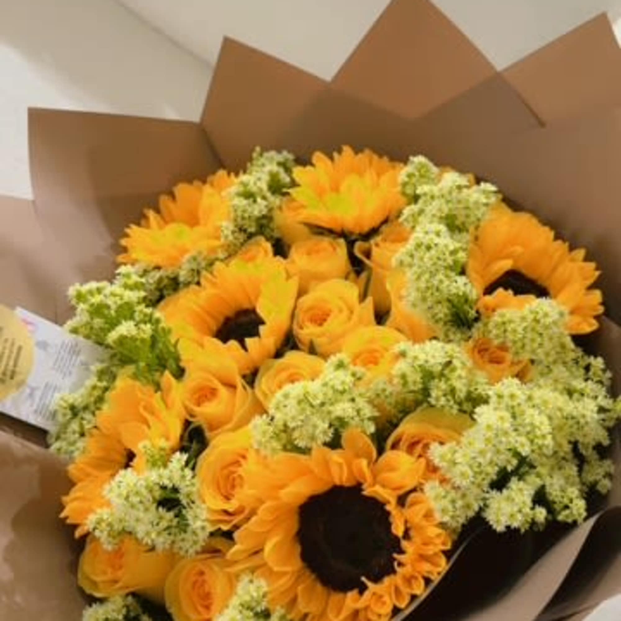 An explosion of light, color, and love this radiant arrangement blends the