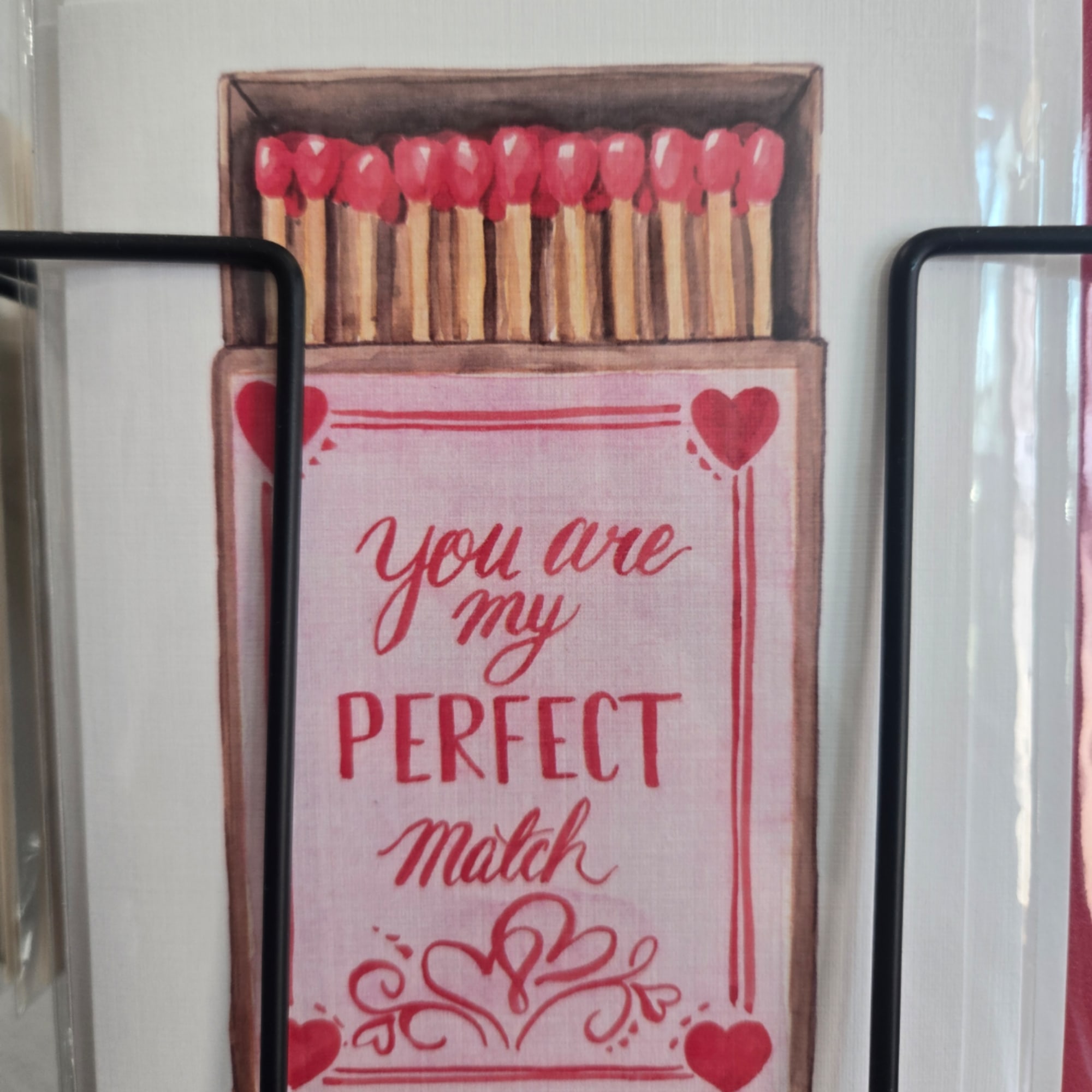 Decorative matchbox with red-tipped matches and a Valentine message