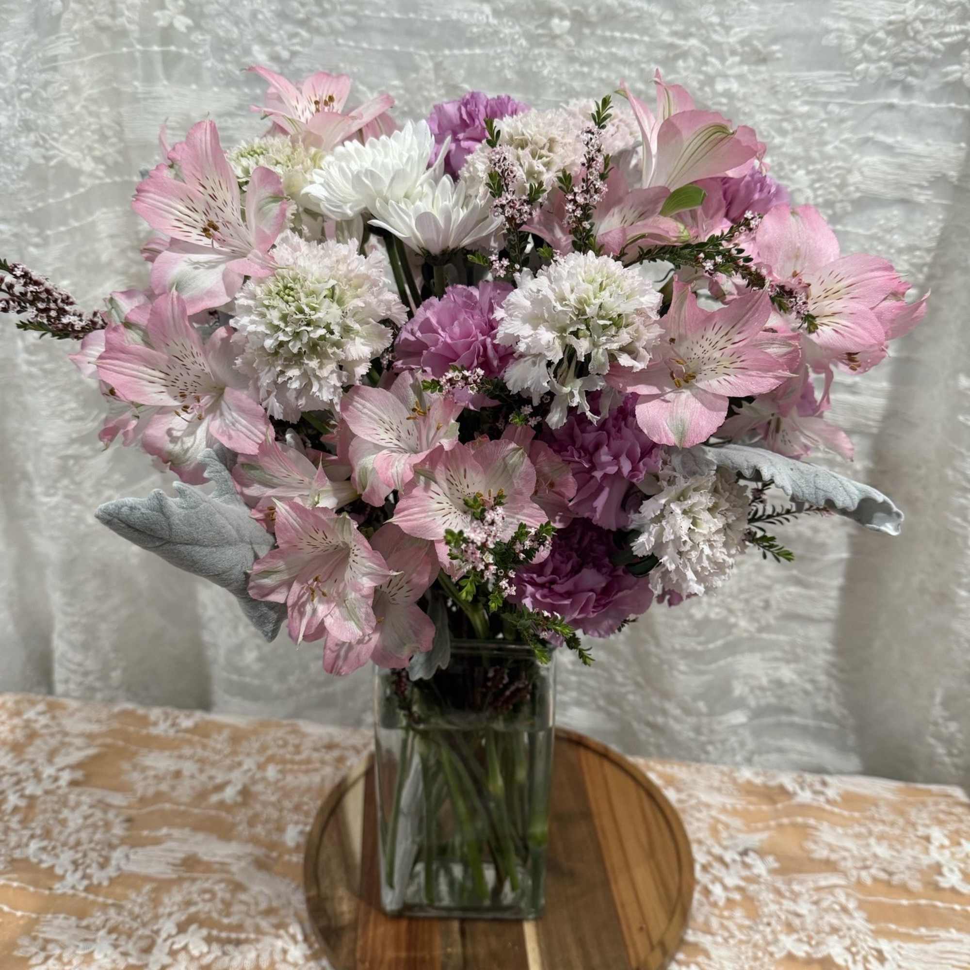 Rose free arrangement

Scabiosa, Carnations, Alstroemeria, and Dusty Miller