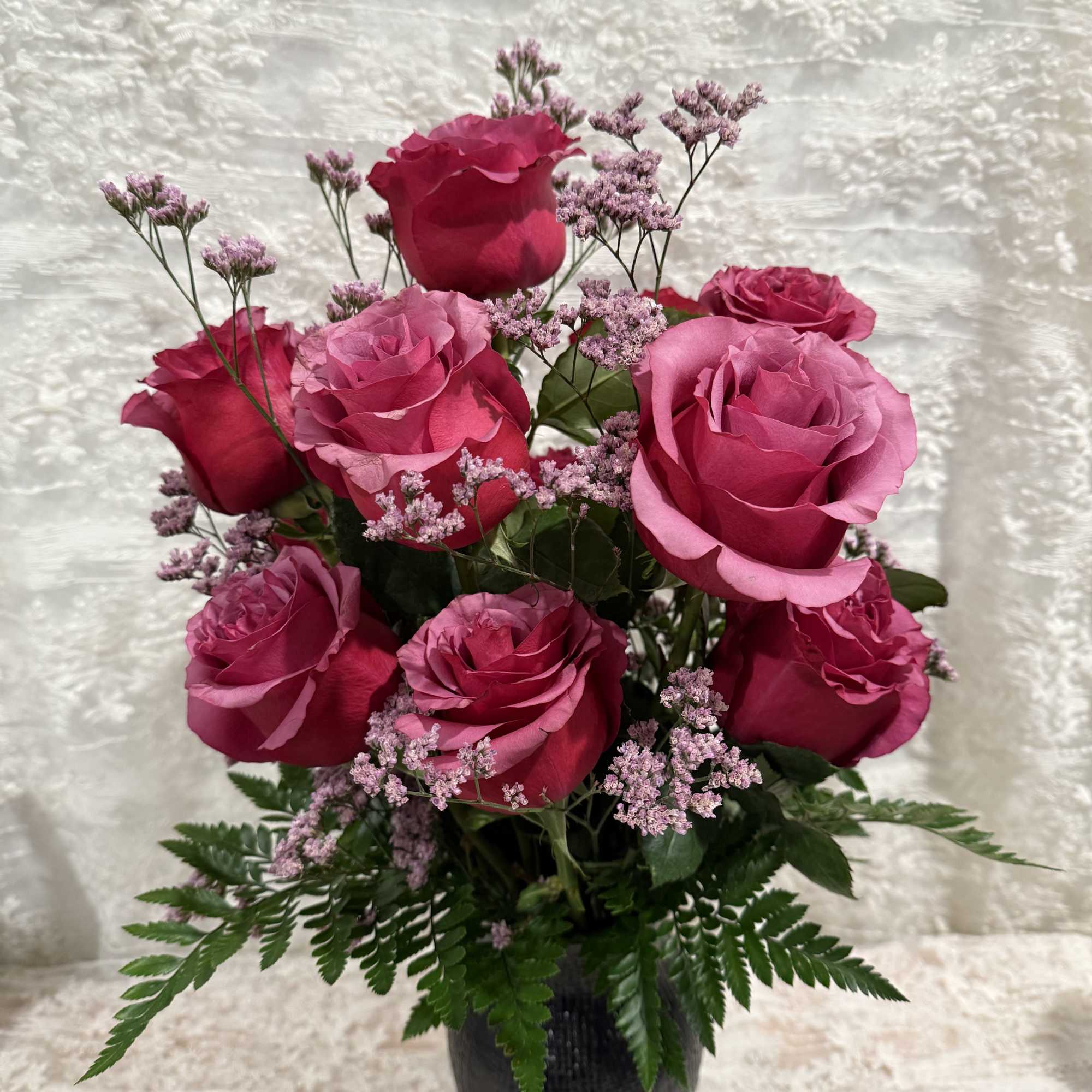 One dozen burgundy/wine color roses

Great for any occasion 
