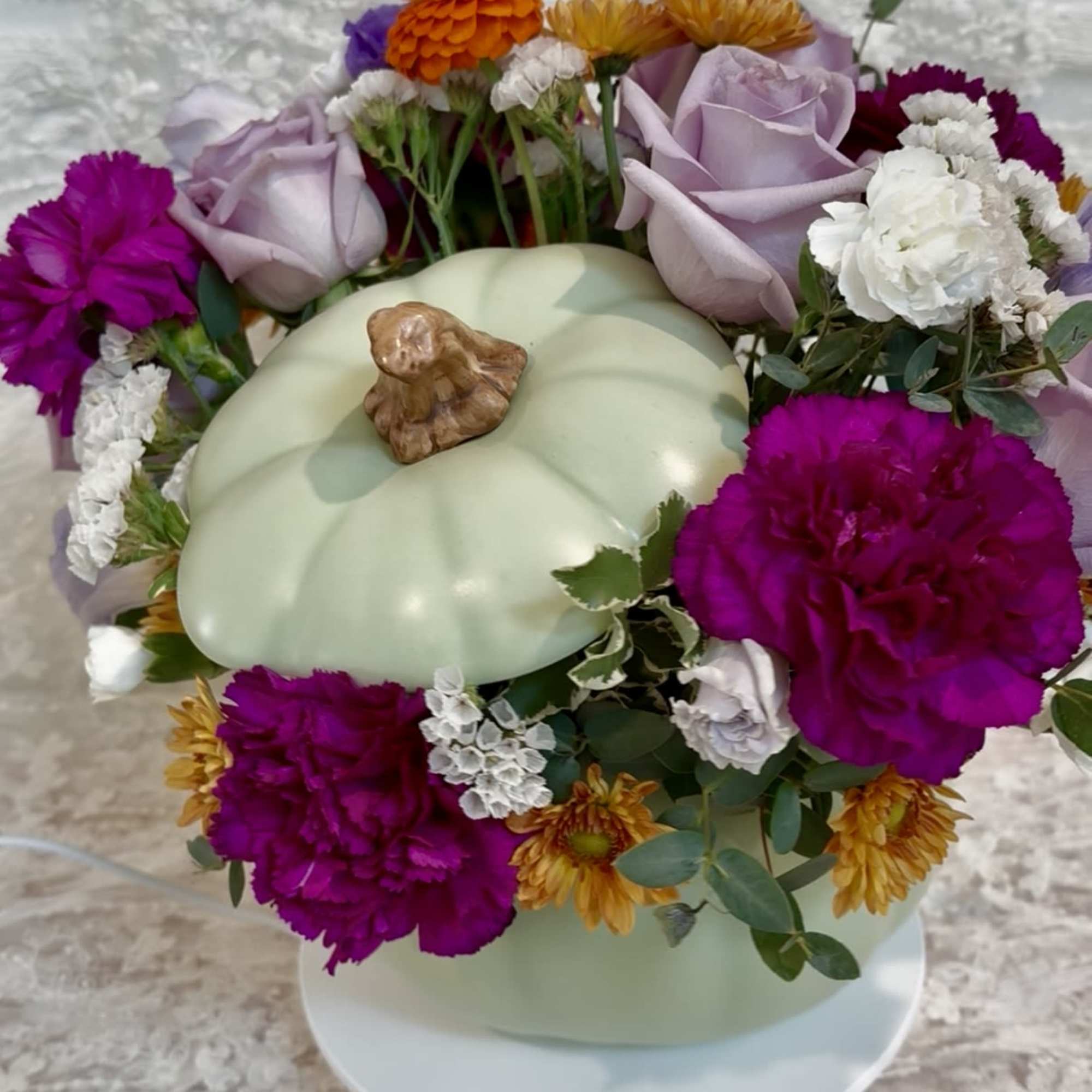 Sage ceramic pumpkin with lid filled with purple tone flowers with a, photo 2 of 4