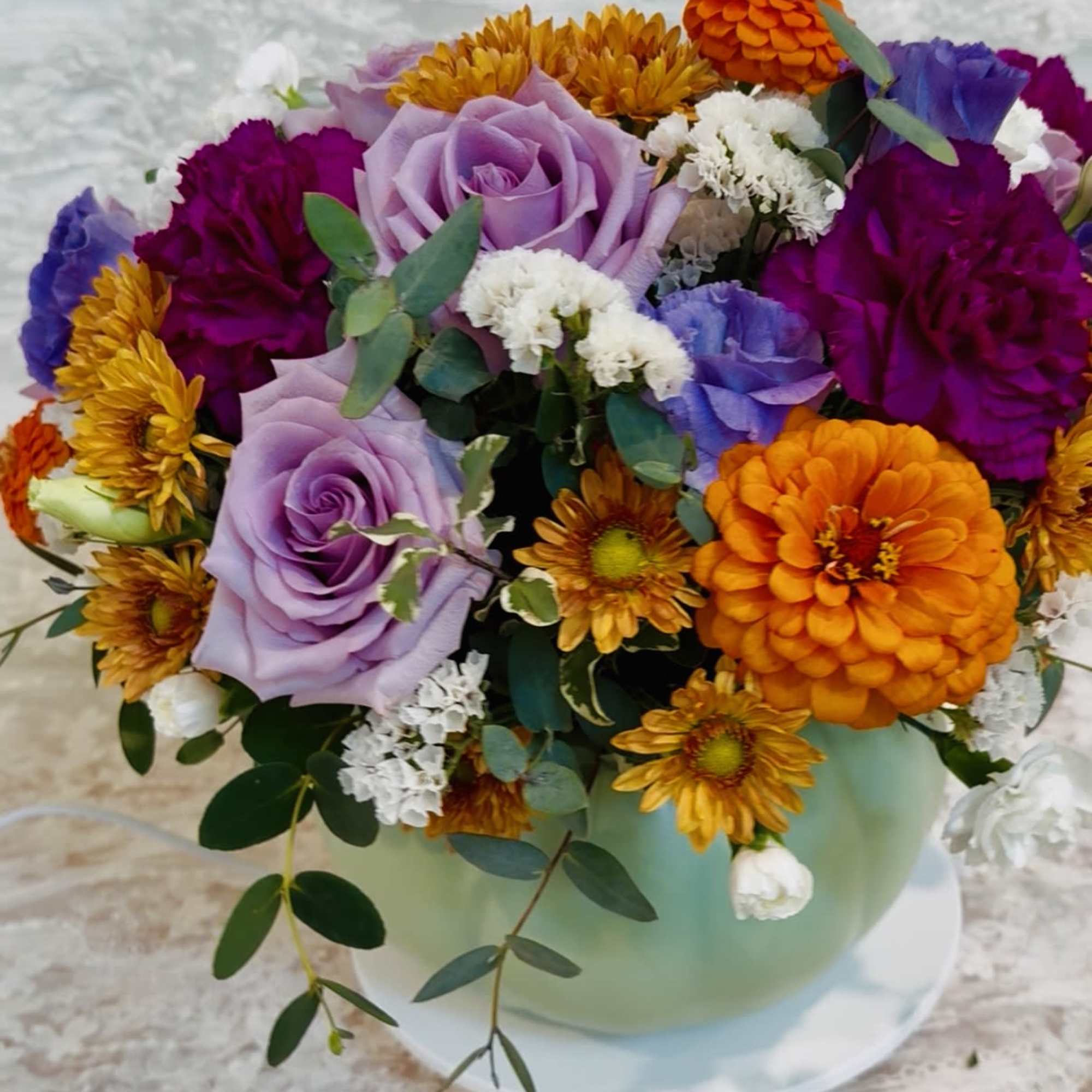 Sage ceramic pumpkin with lid filled with purple tone flowers with a, photo 3 of 4