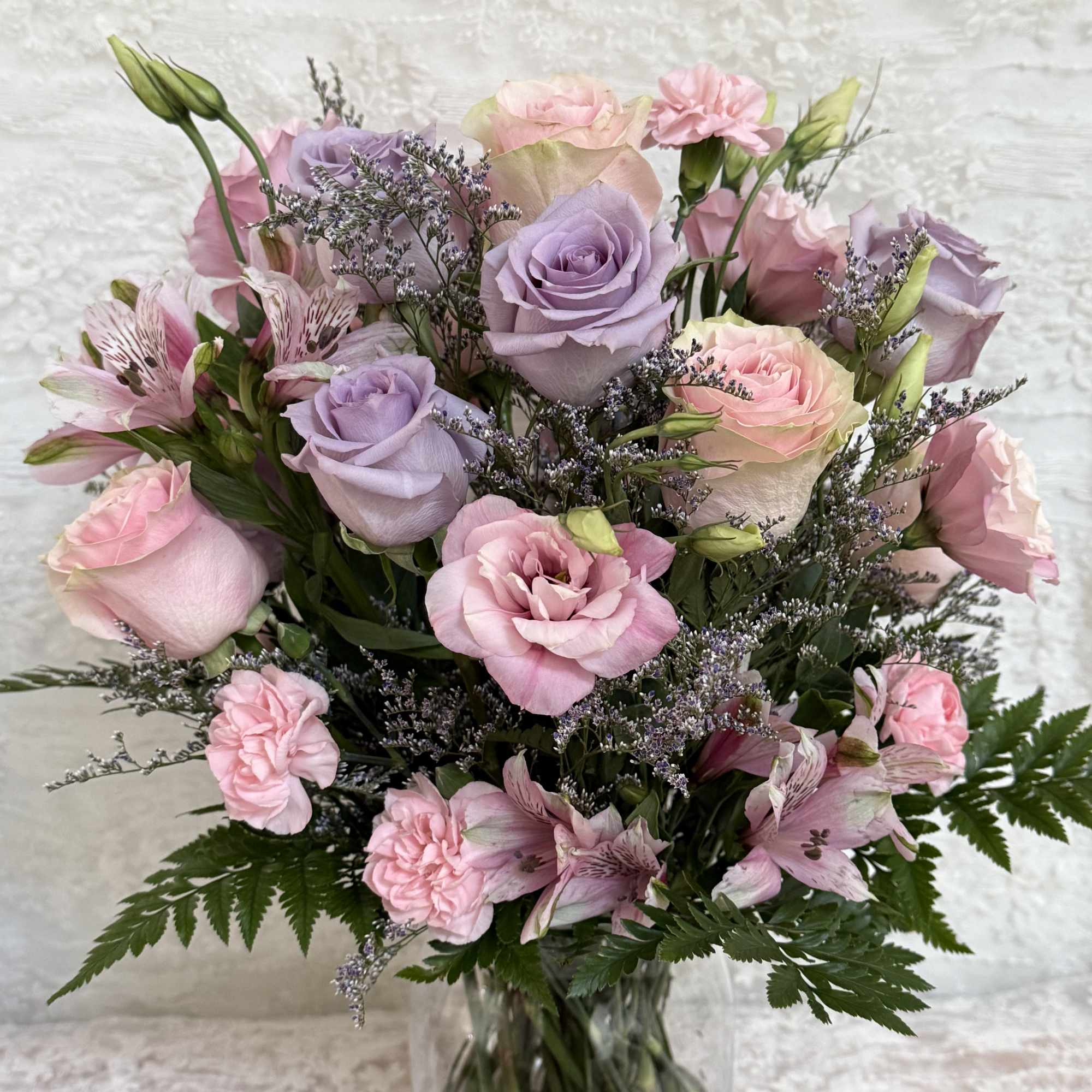 Send your loved one some birthday wishes 

Mix arrangement of light pink