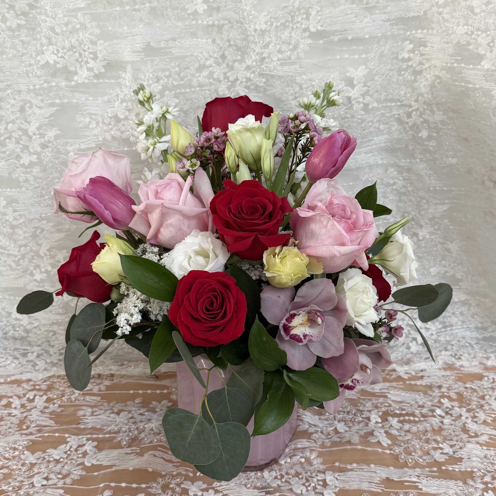 Lux arrangement with Tulips, Orchids, Roses, Lisianthus, wax flower stock flower with, photo 2 of 3