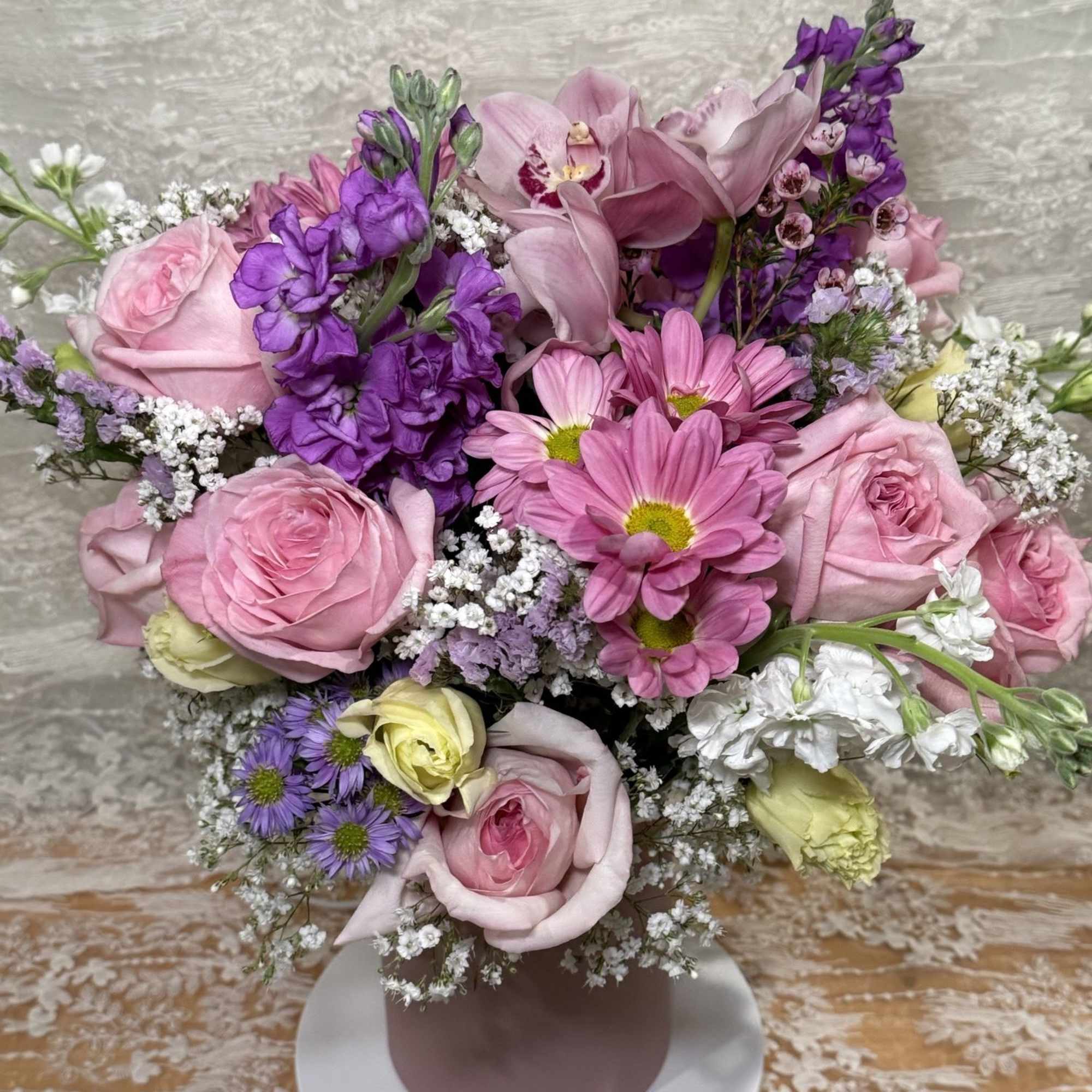 Lisianthus, Orchids, Roses, Stock flowers, spray Mums and Asters in a light, photo 2 of 3