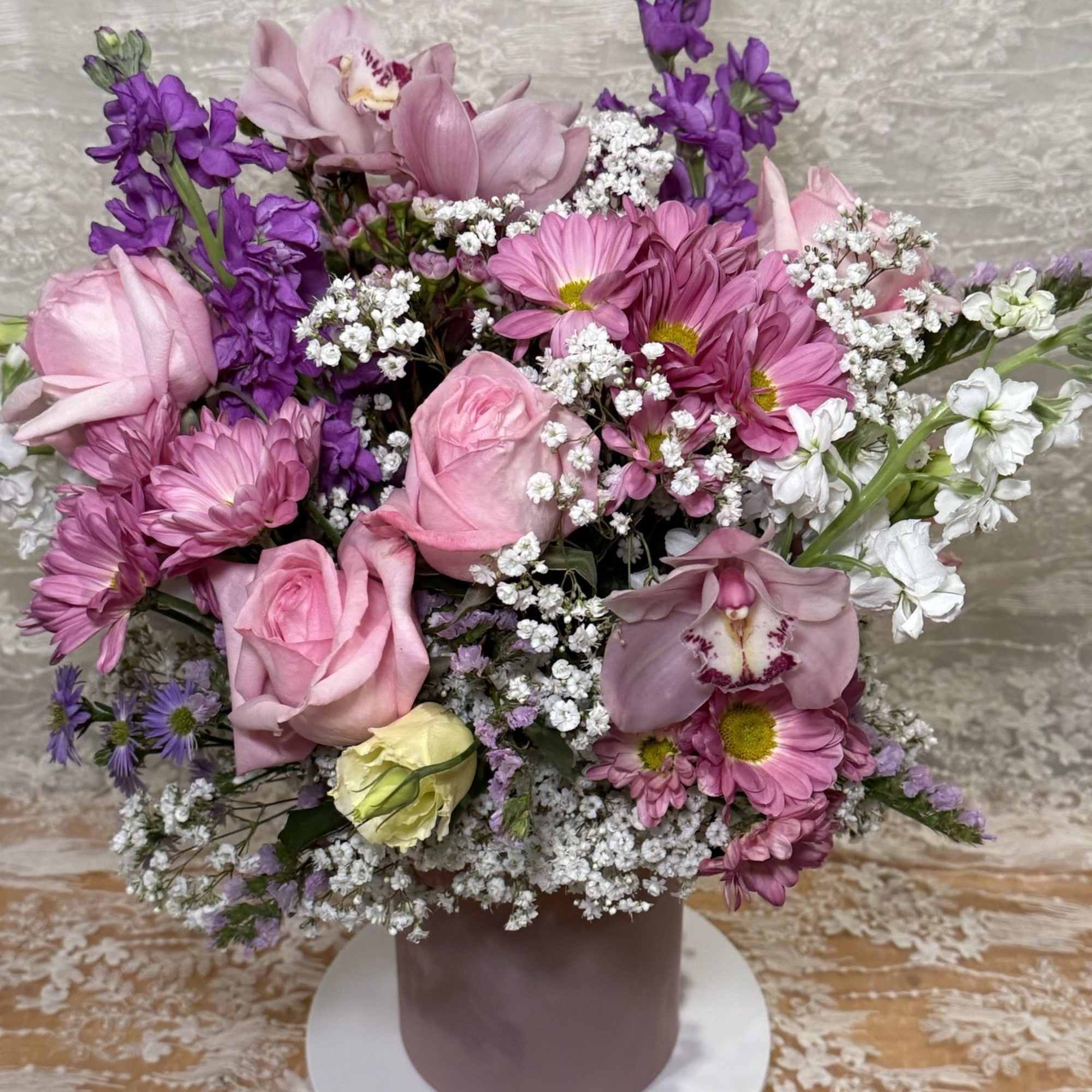 Lisianthus, Orchids, Roses, Stock flowers, spray Mums and Asters in a light, photo 3 of 3