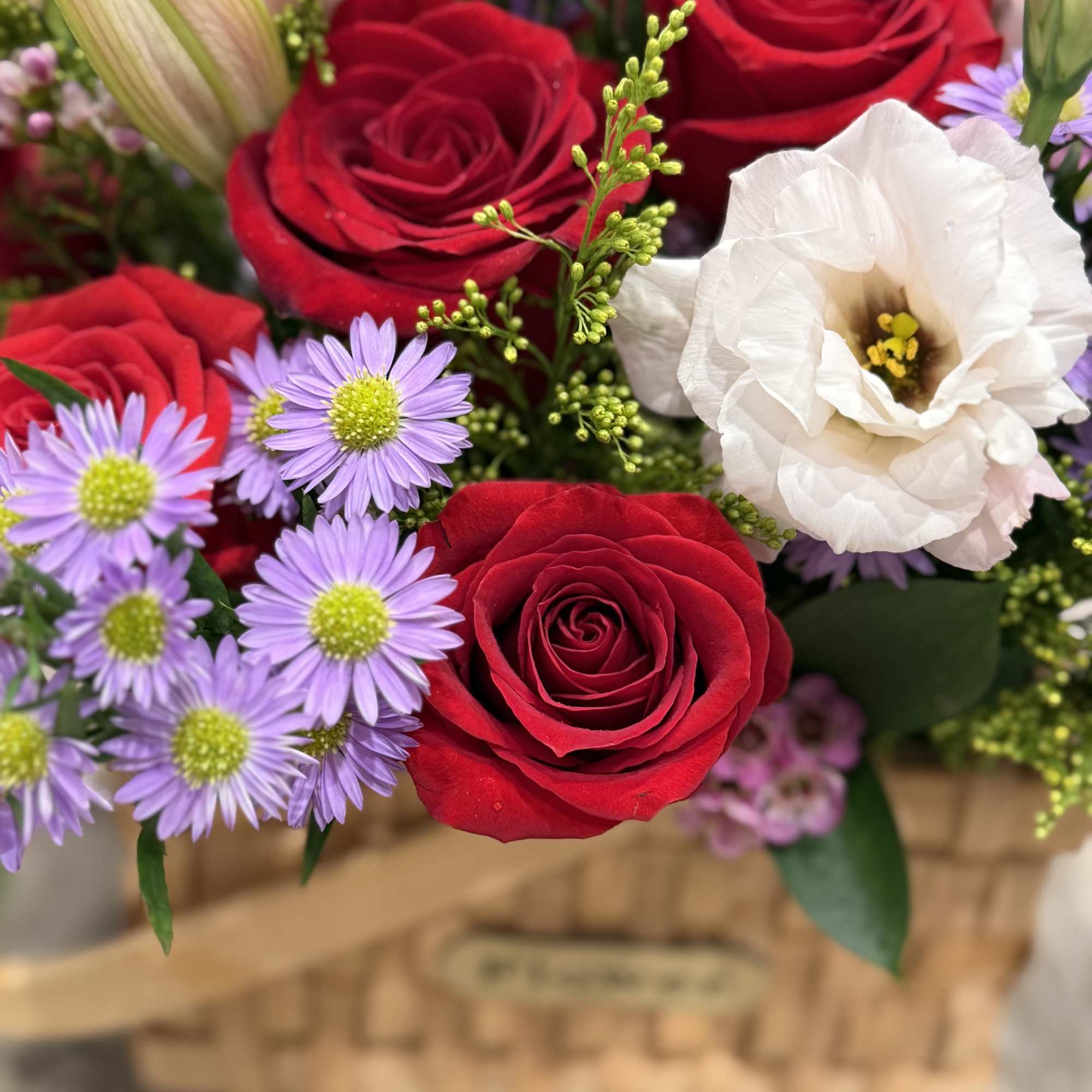 Basket filled with in season flowers and greenery

Pink, purple and white flowers, photo 3 of 3