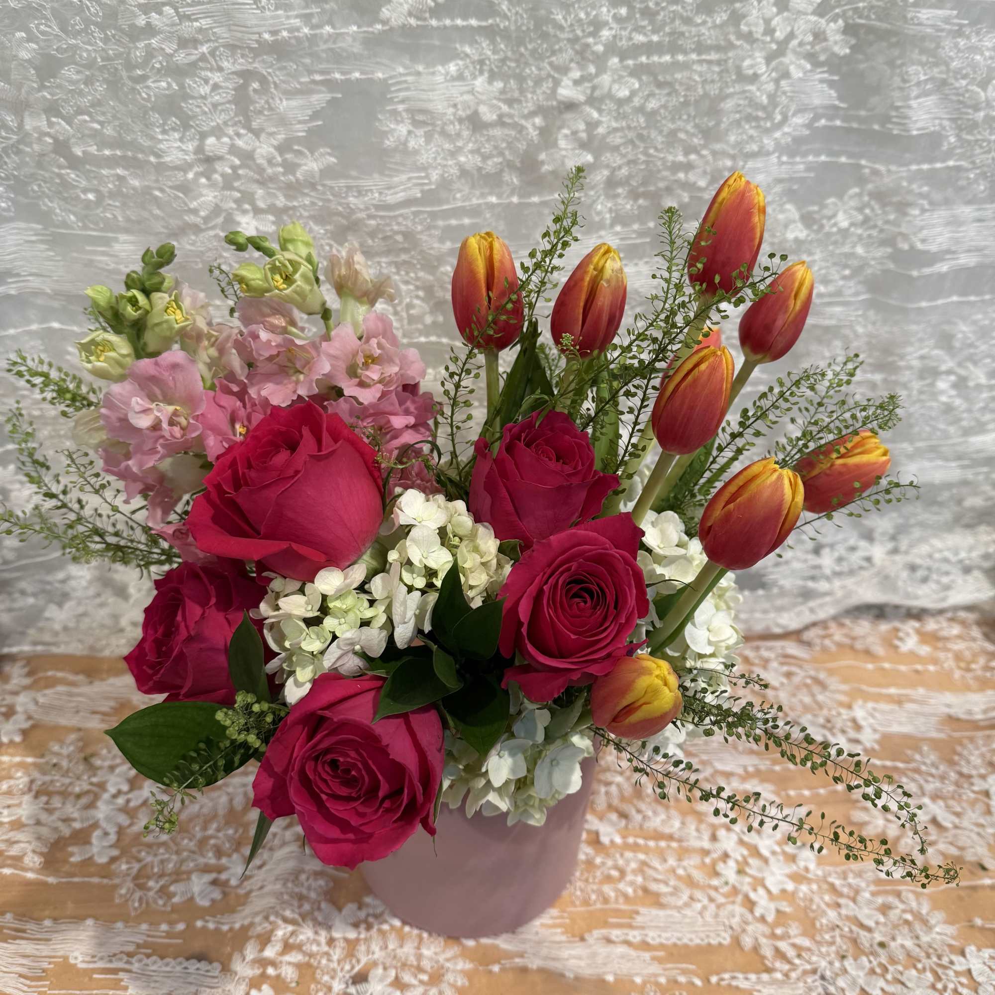Hot pink roses, pink snap dragons, white hydrangeas and orange tulips , photo 2 of 2