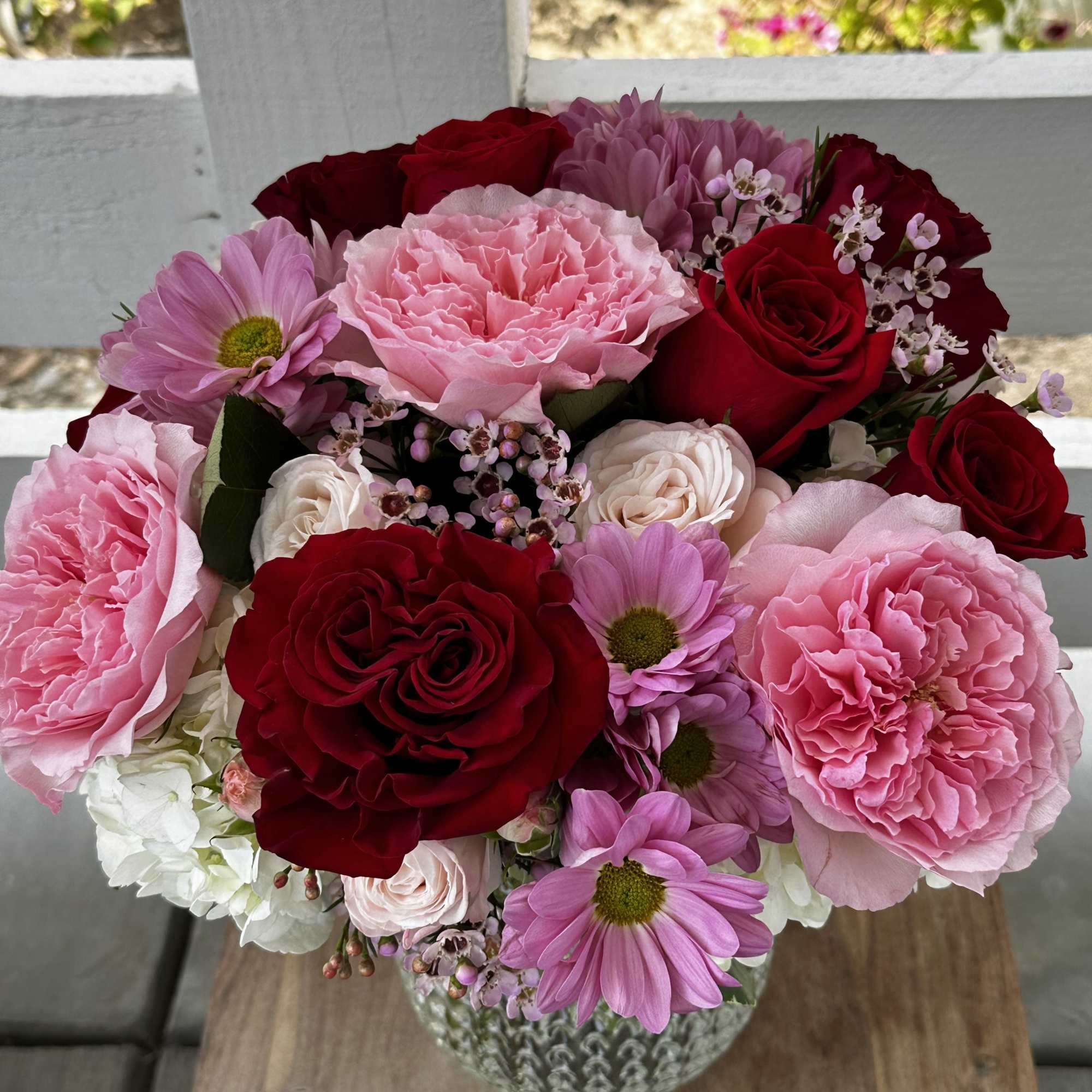 Mixture of garden roses, spray roses and regular roses with hydrangeas and, photo 2 of 2