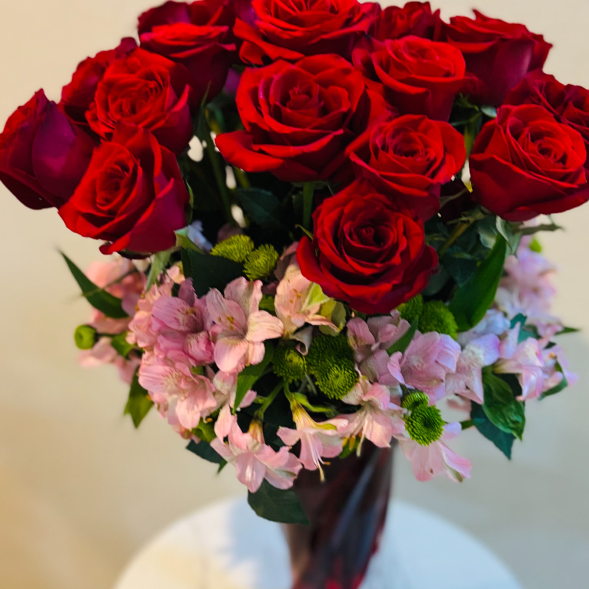 Bouquet of red roses and pink alstroemeria flowers