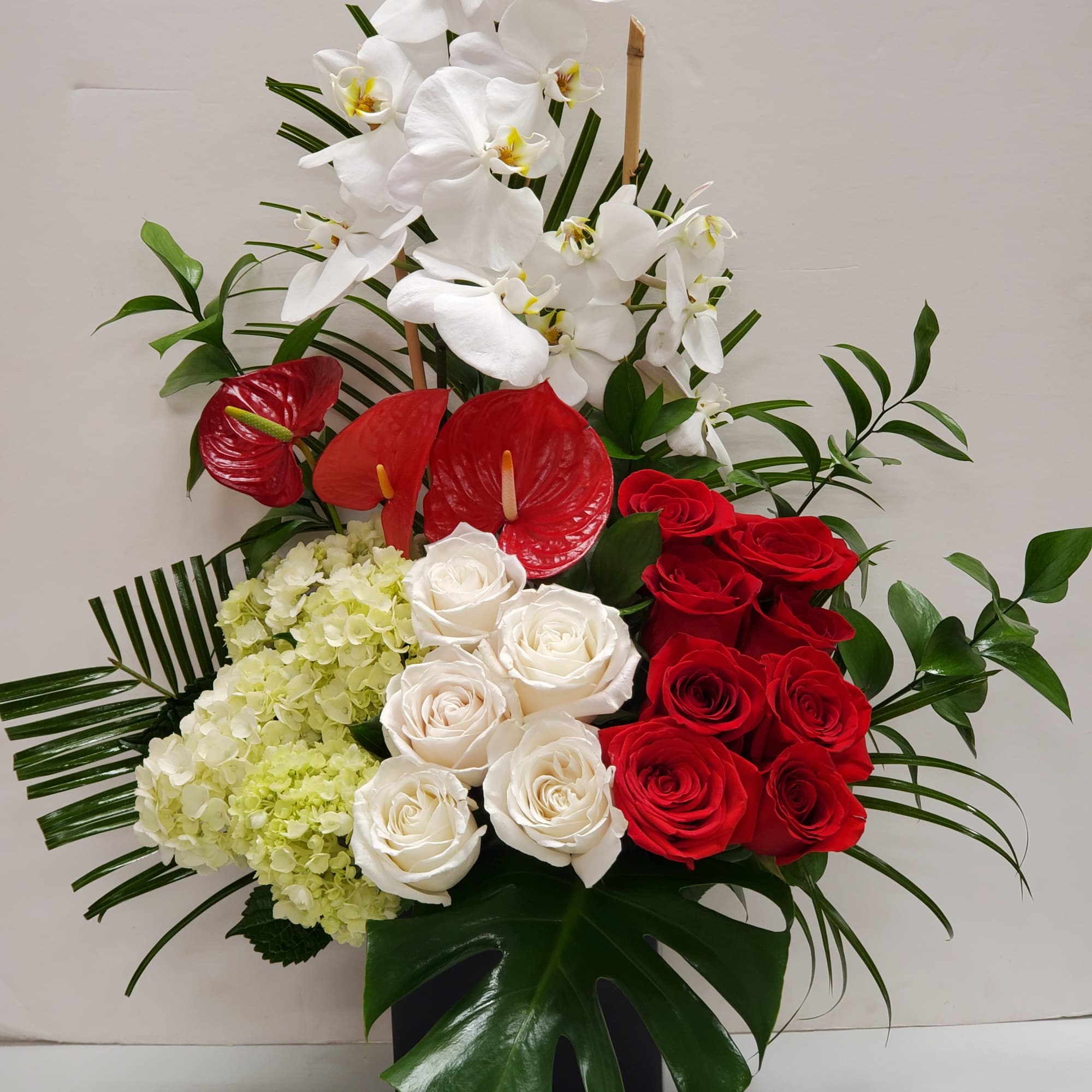 Tropical romance is a beautiful romantic arrangement with orchid, roses, hydrangea and, photo 3 of 3