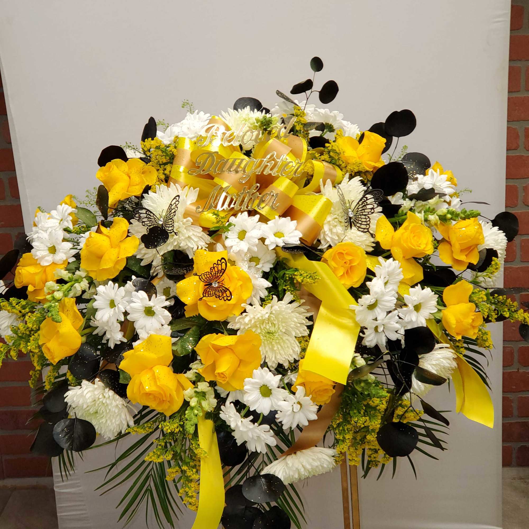 Yellow, white and black Casket 