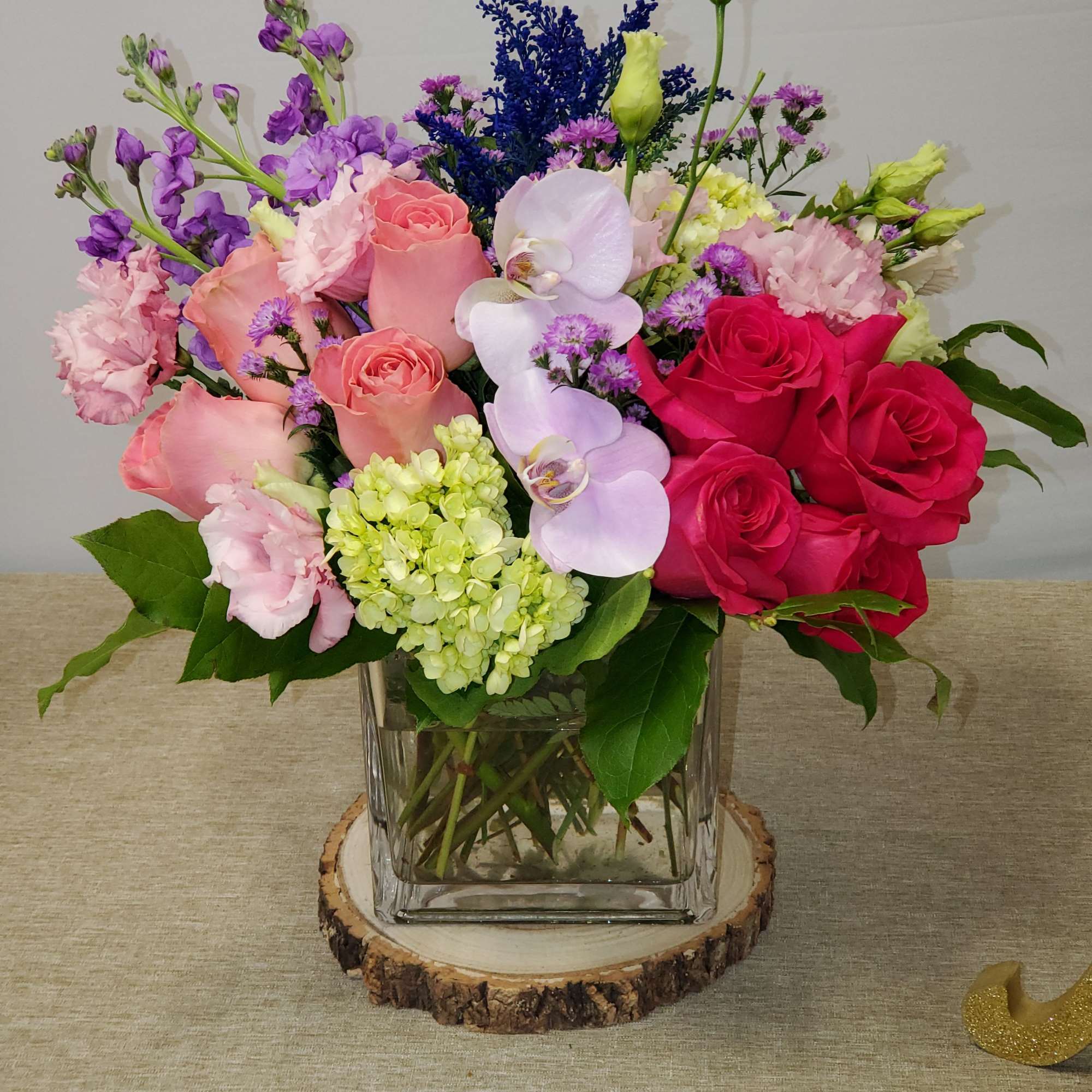 Mixed flowers for a garden looking arrangement.