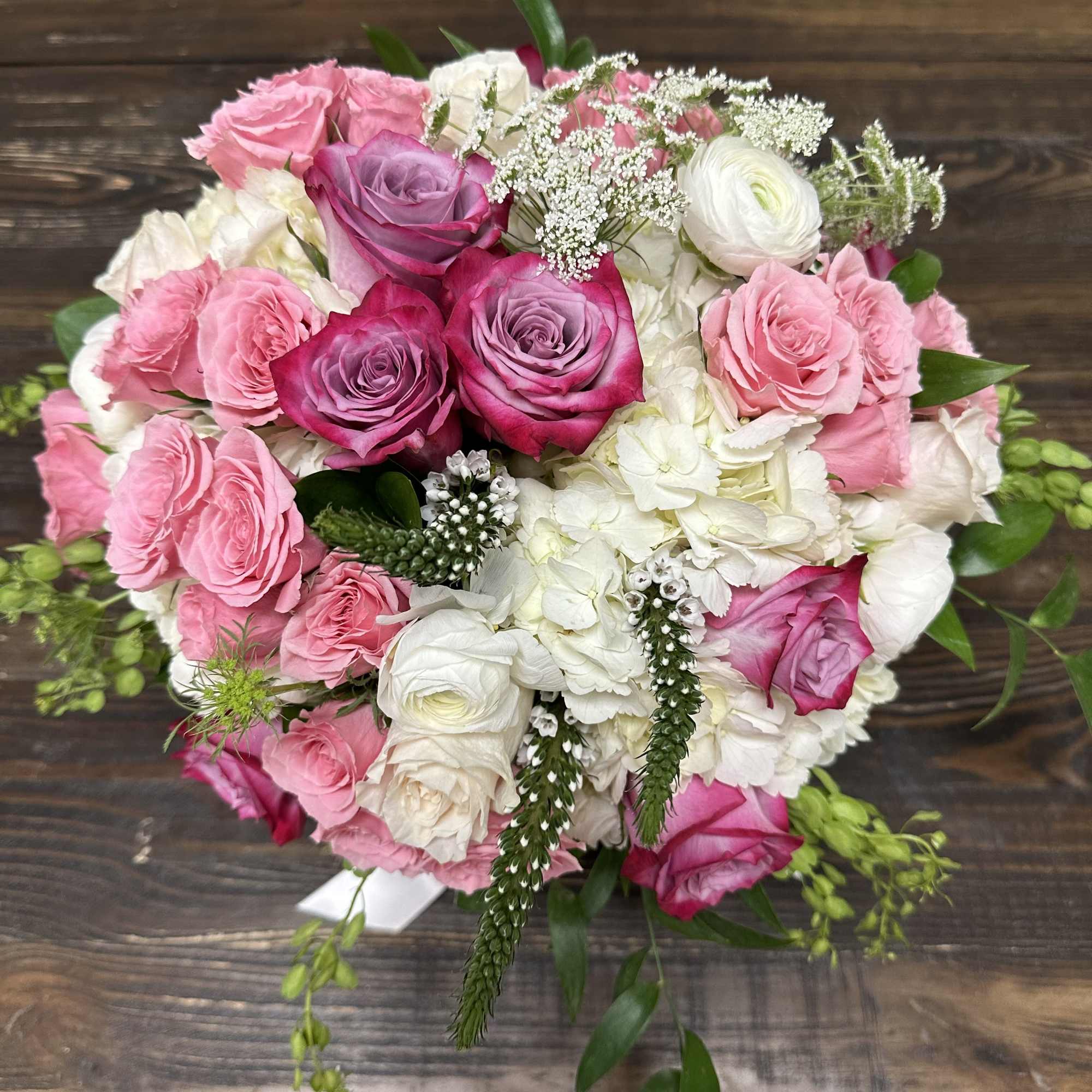 Pink and white rose bouquet with hydrangeas and filler flowers