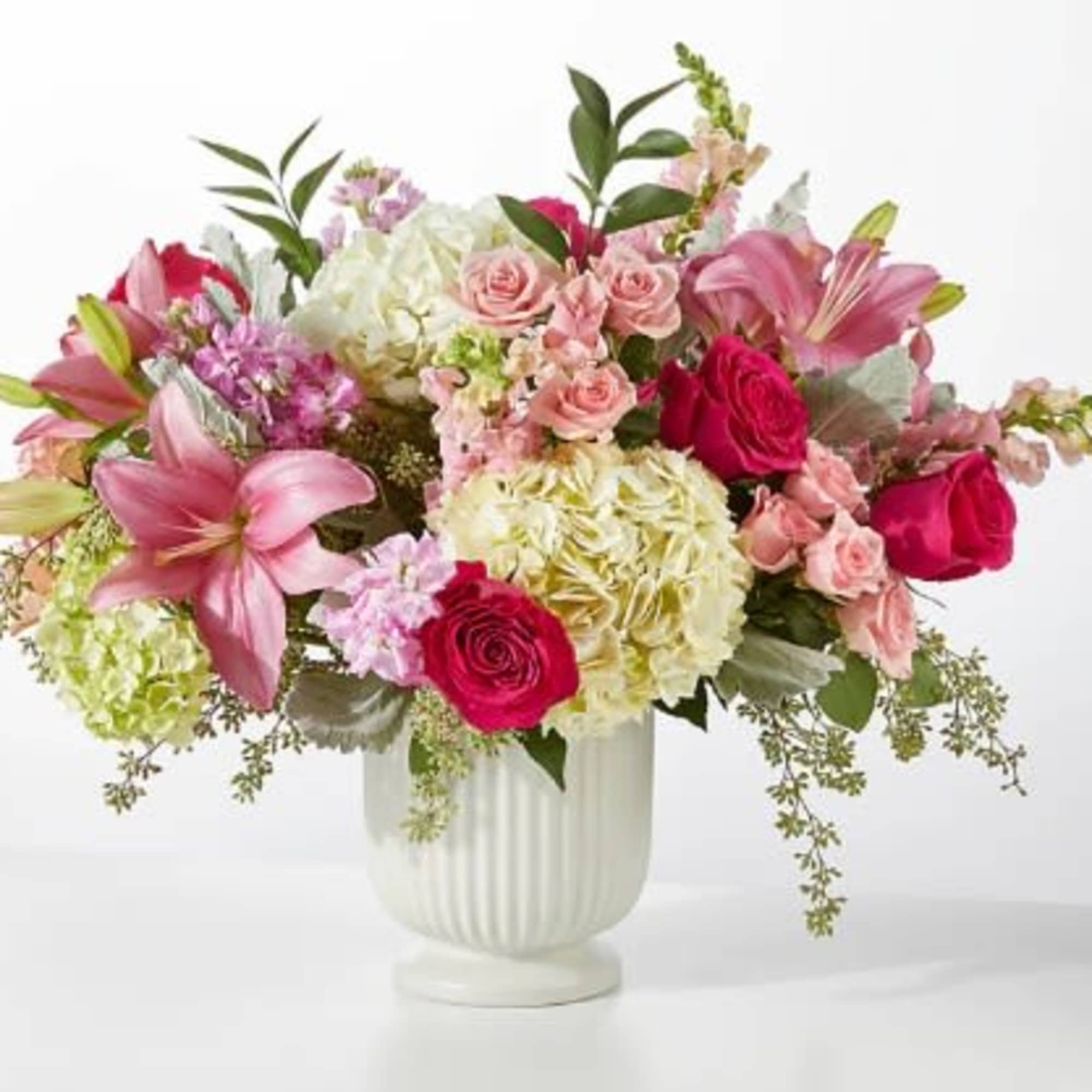 A spectacularly striking arrangement of hot pink, pale pink, white and green