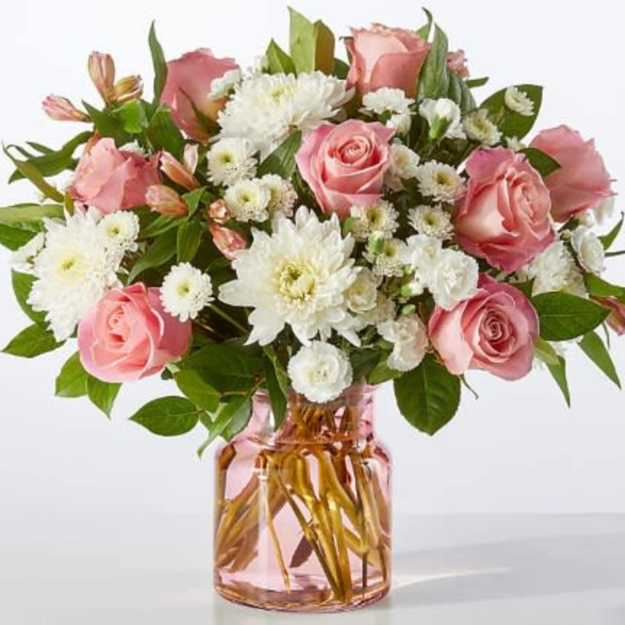 Your recipient will be falling for these blushing alstroemeria and white mums