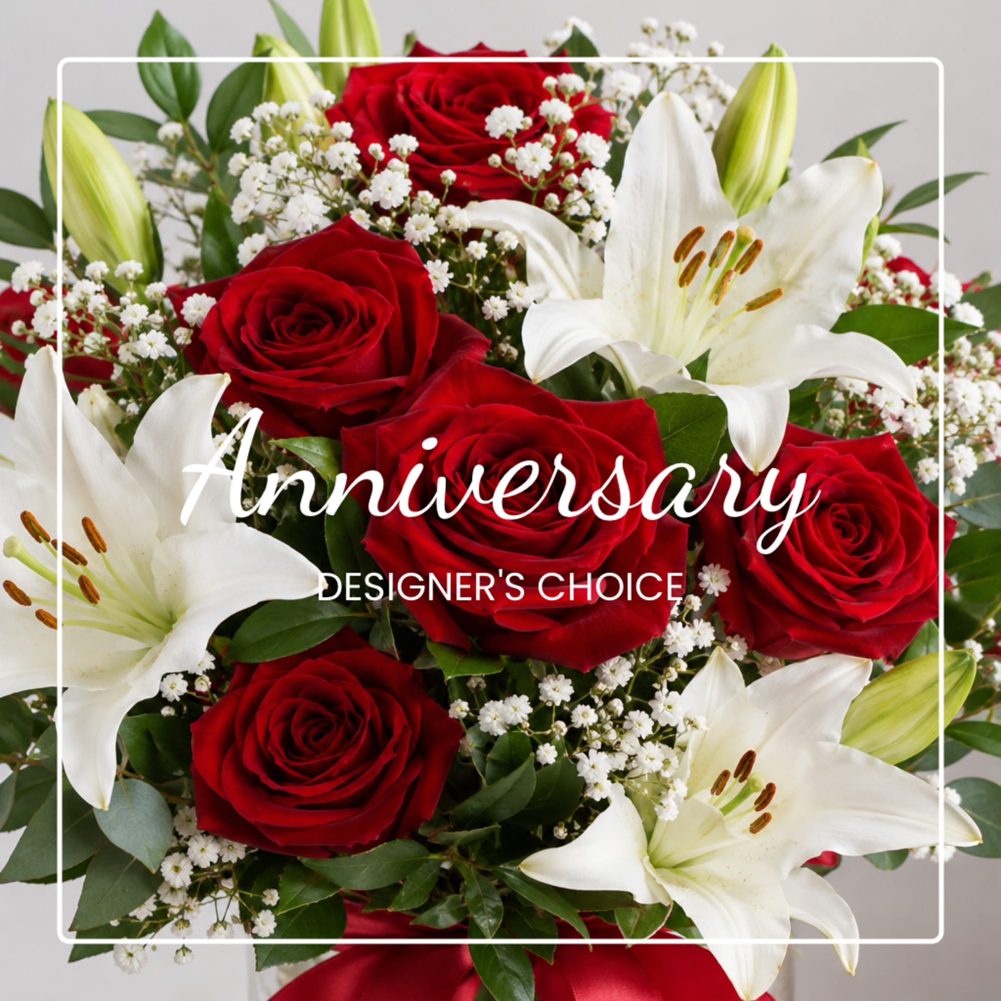 Red roses and white lilies with baby's breath in a bouquet