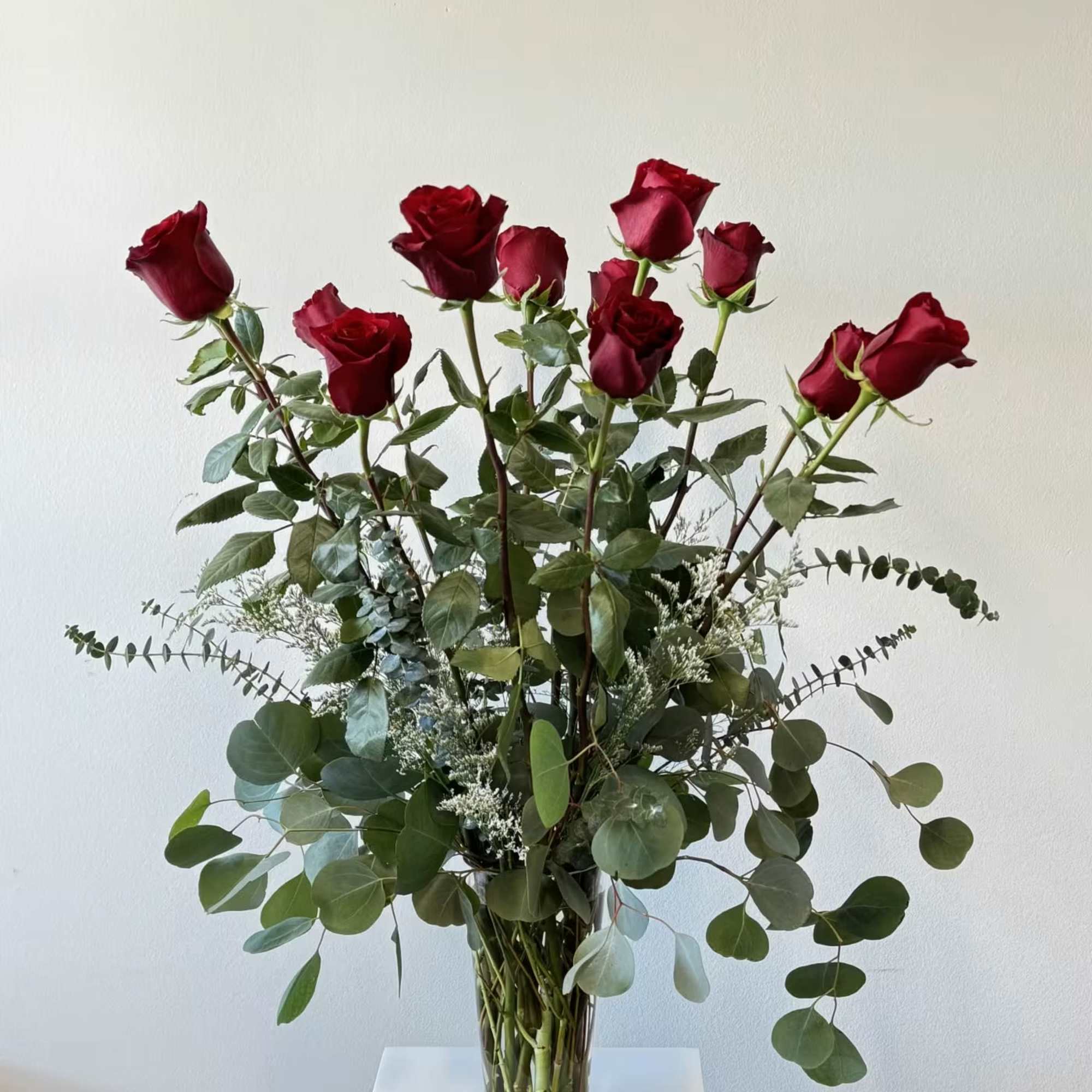 Indulge in timeless romance with the Super Long Stemmed Red Roses bouquet
