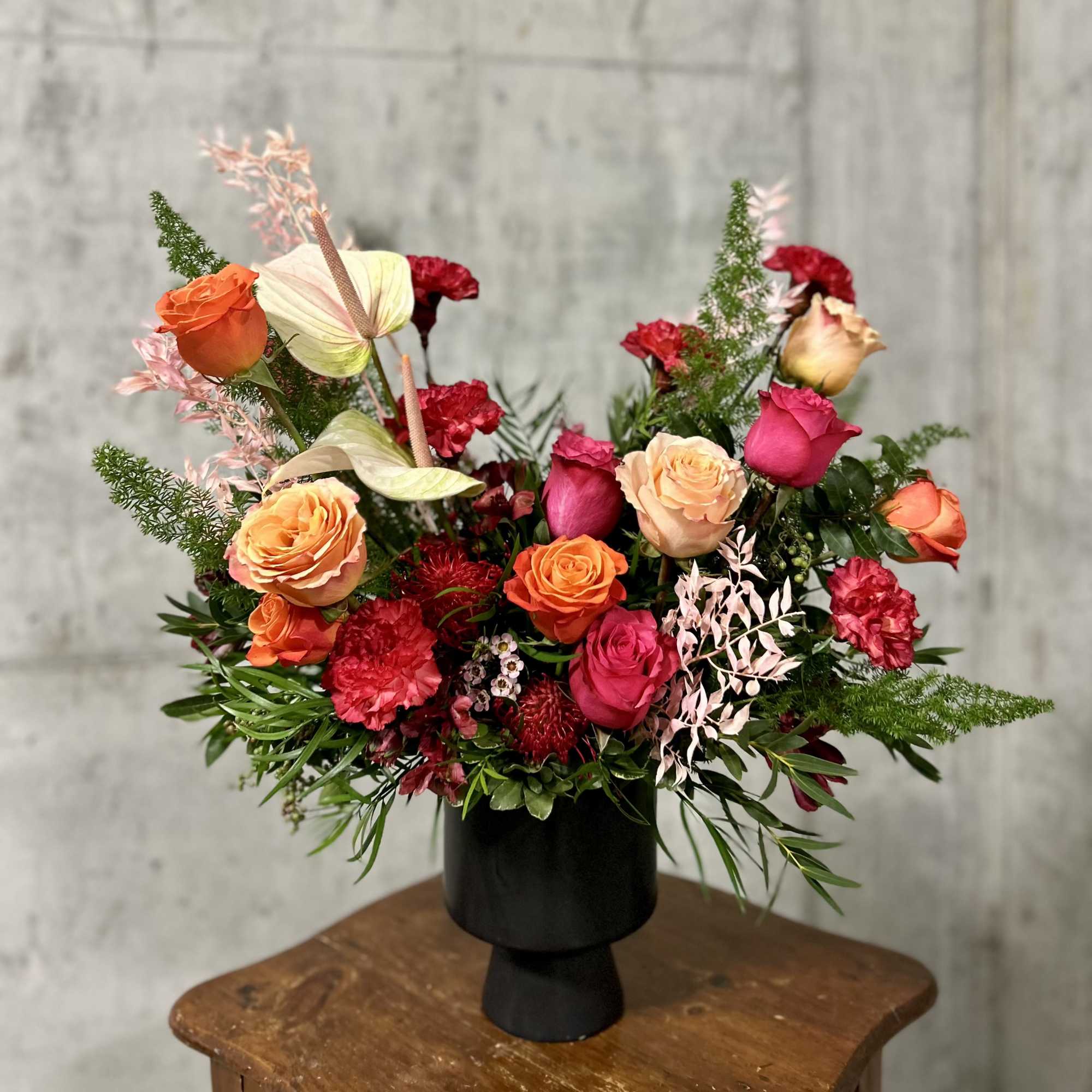 This fiery subtropical arraignment will make a bold statement with vibrant colors