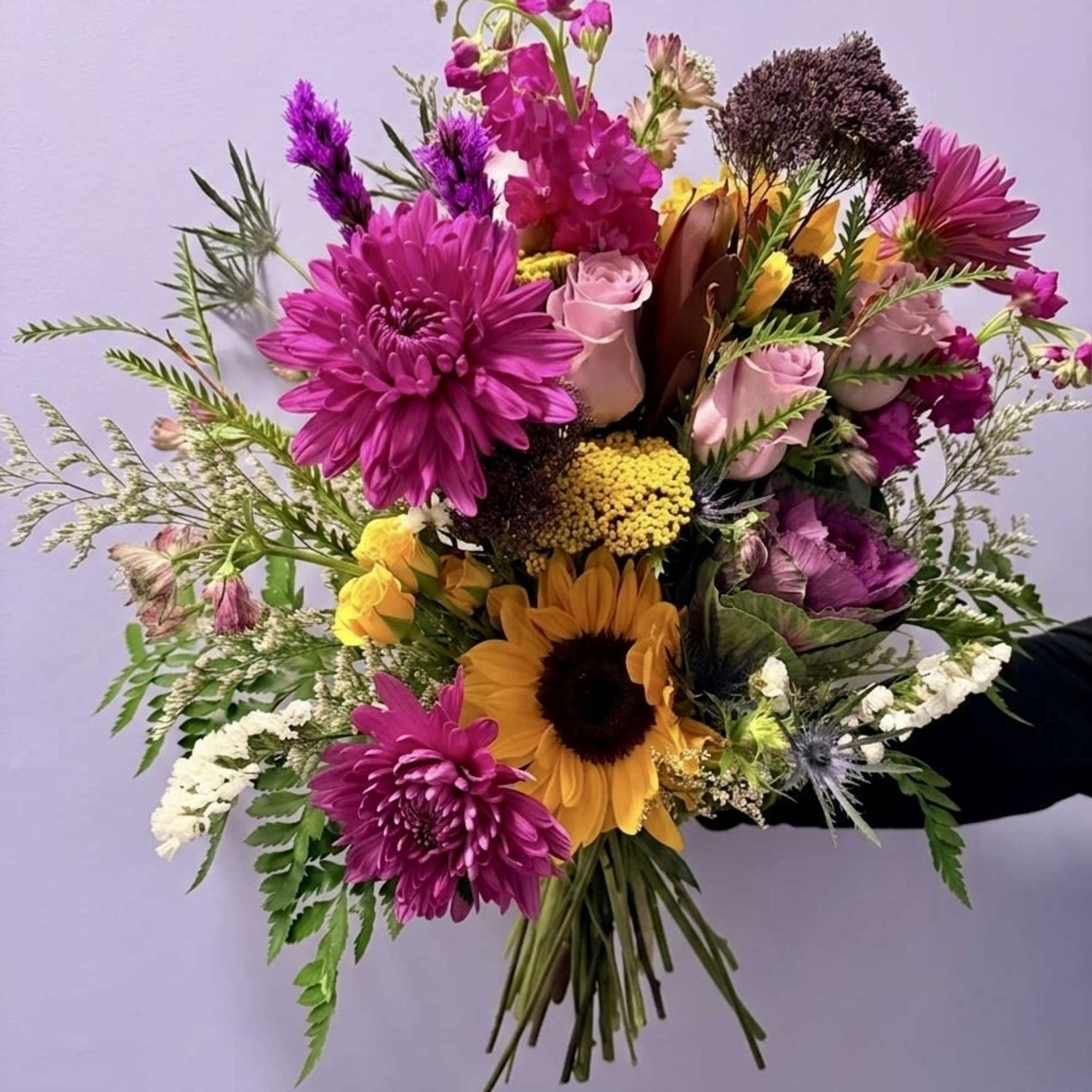 A vibrant, textured arrangement that captures the wild elegance of a Southern, photo 2 of 4