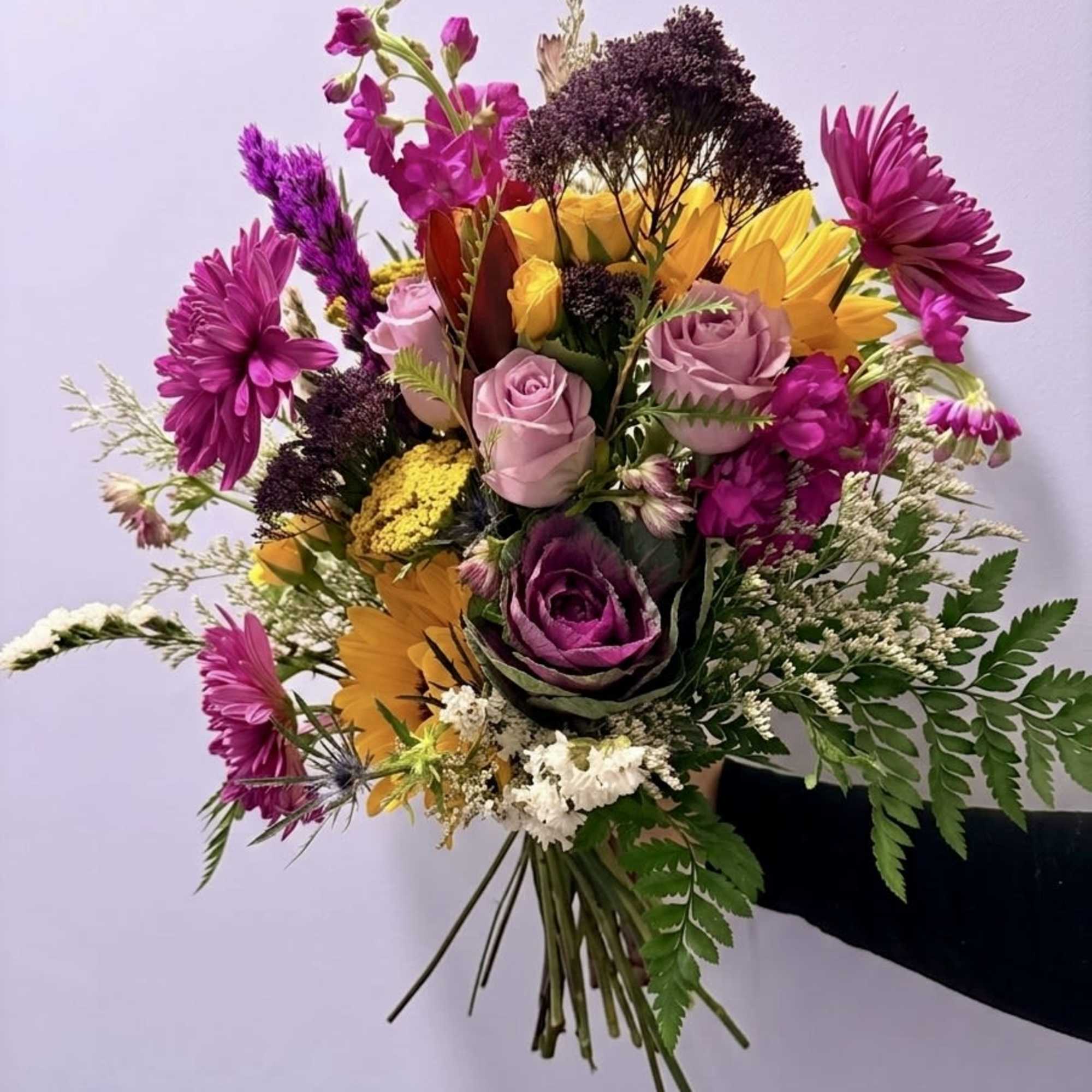 A vibrant, textured arrangement that captures the wild elegance of a Southern, photo 3 of 4