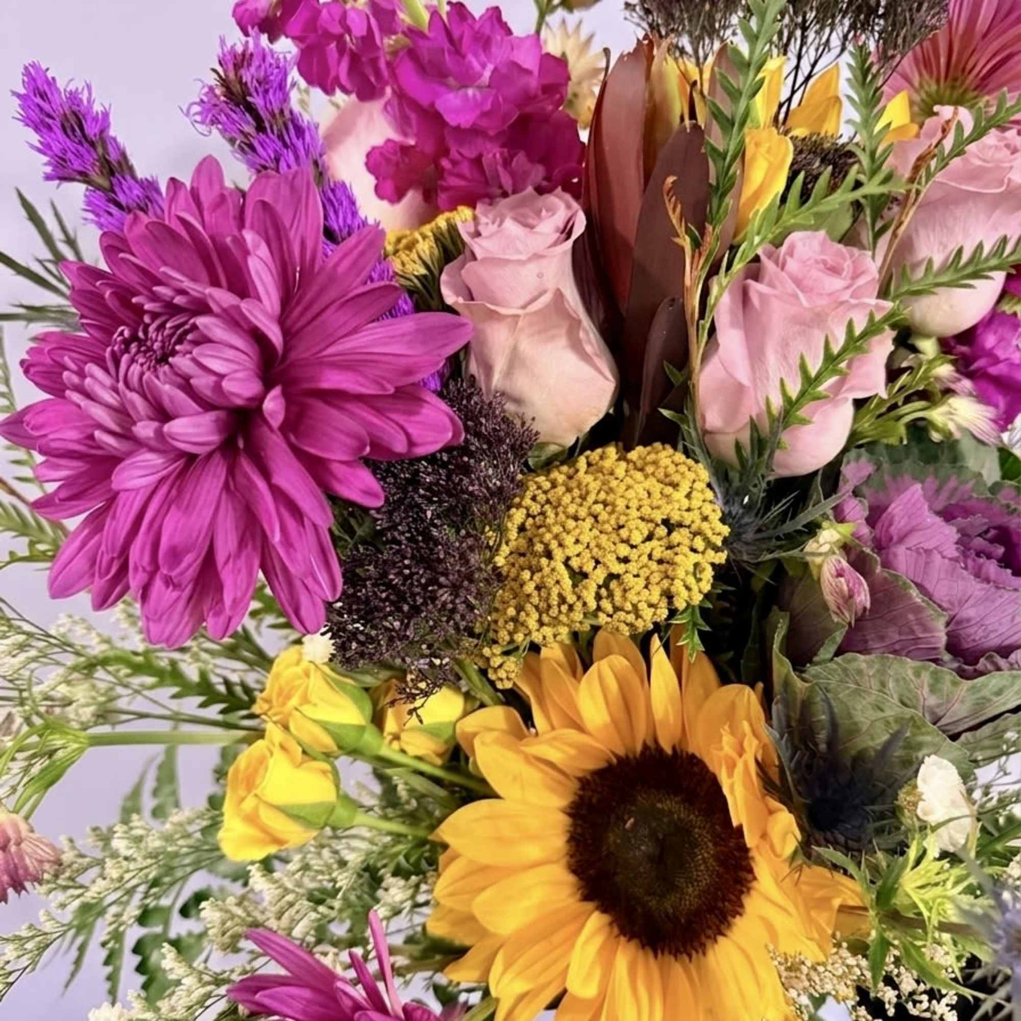 A vibrant, textured arrangement that captures the wild elegance of a Southern, photo 4 of 4