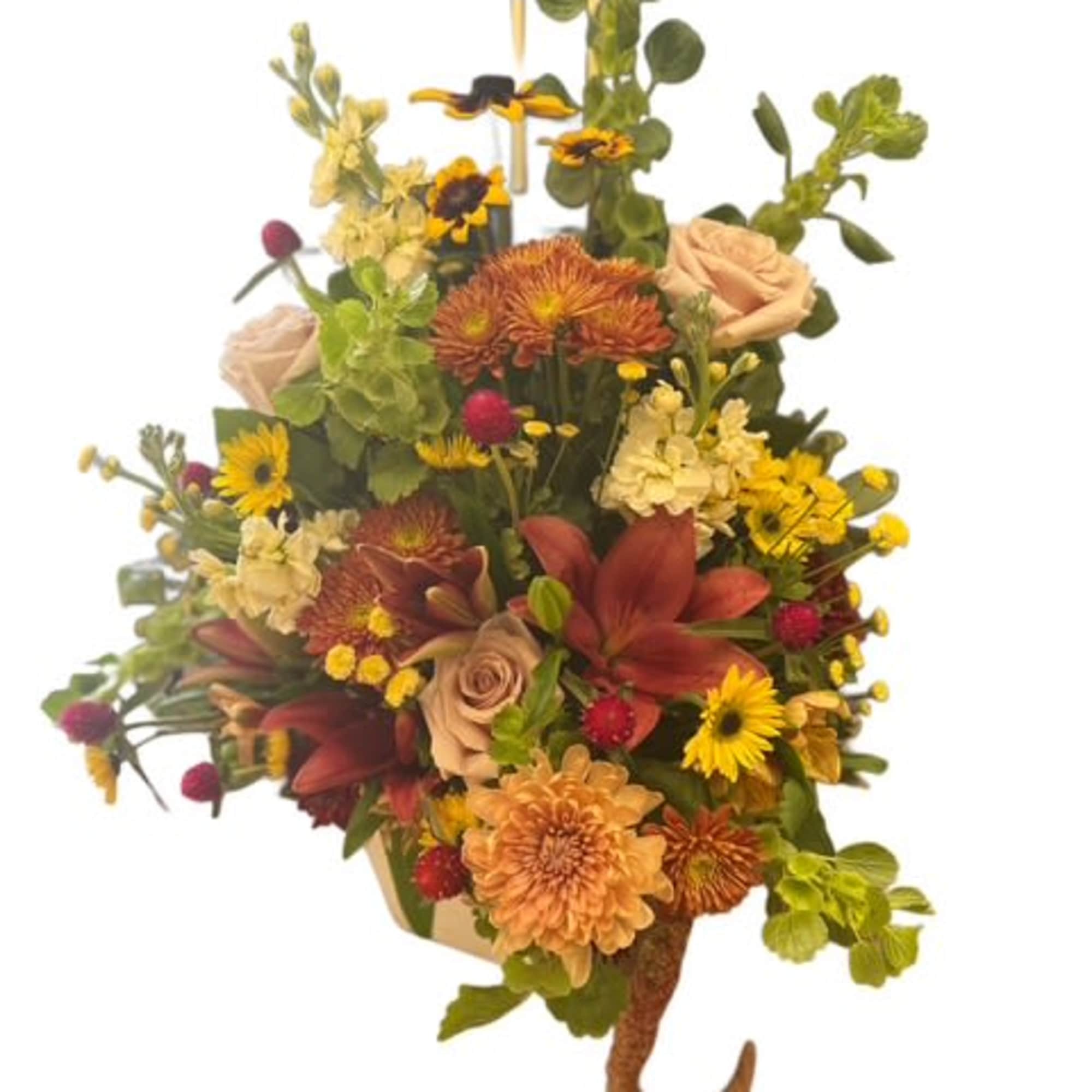 Autumn bouquet with orange lilies, roses, and chrysanthemums