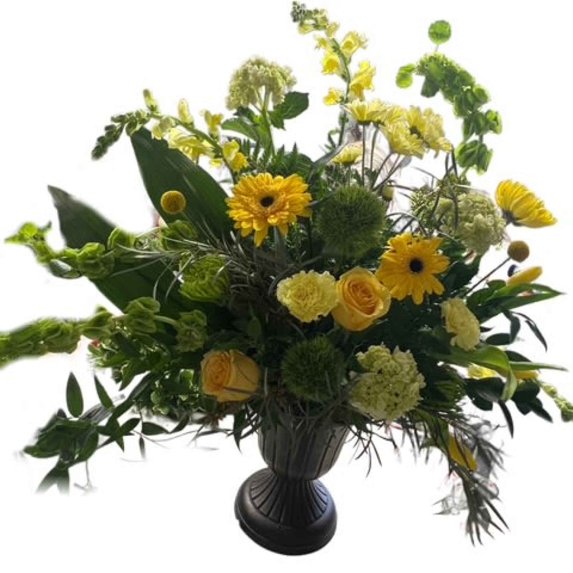 Yellow and green floral arrangement in a dark urn vase
