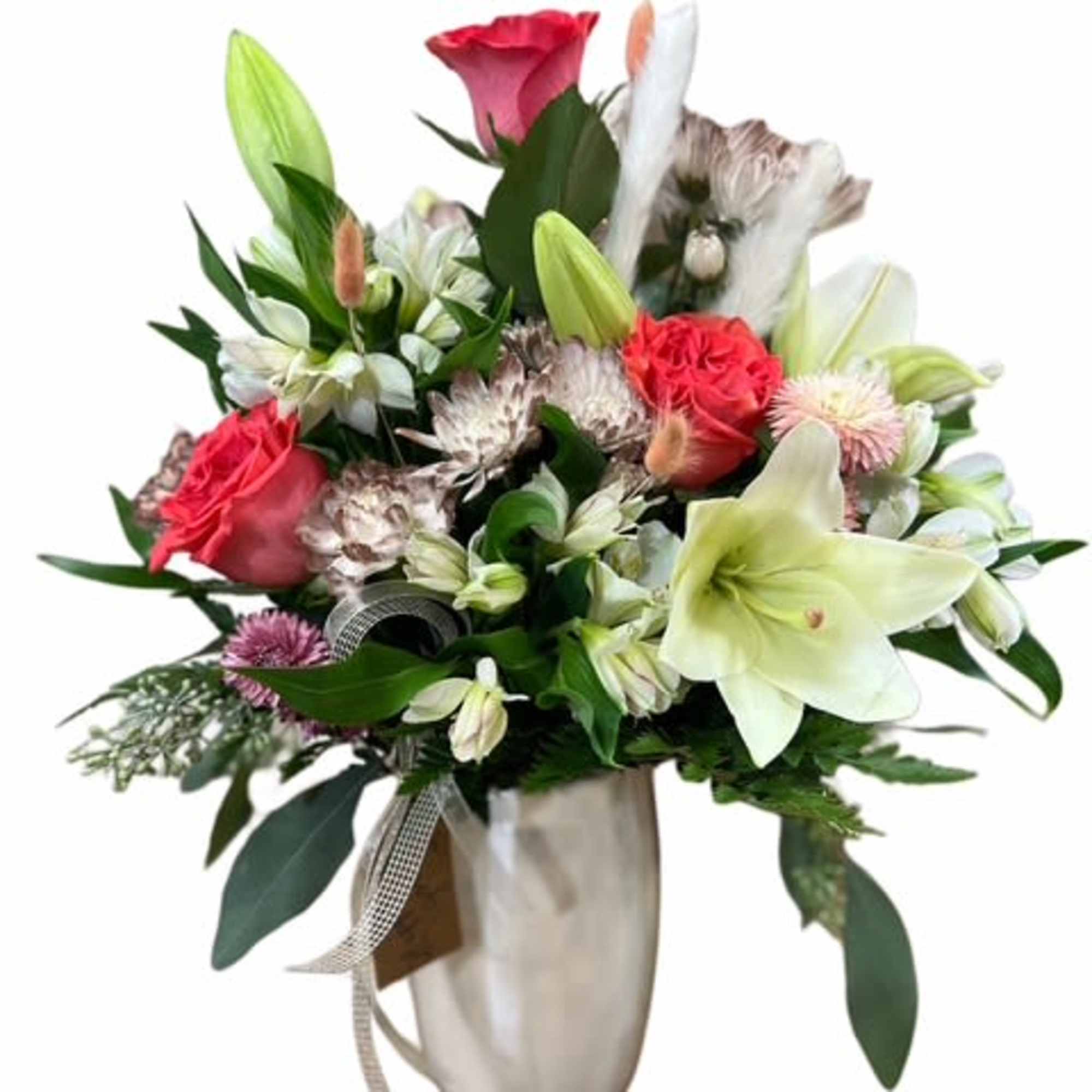 Mixed bouquet with lilies, roses, and alstroemeria in a vase