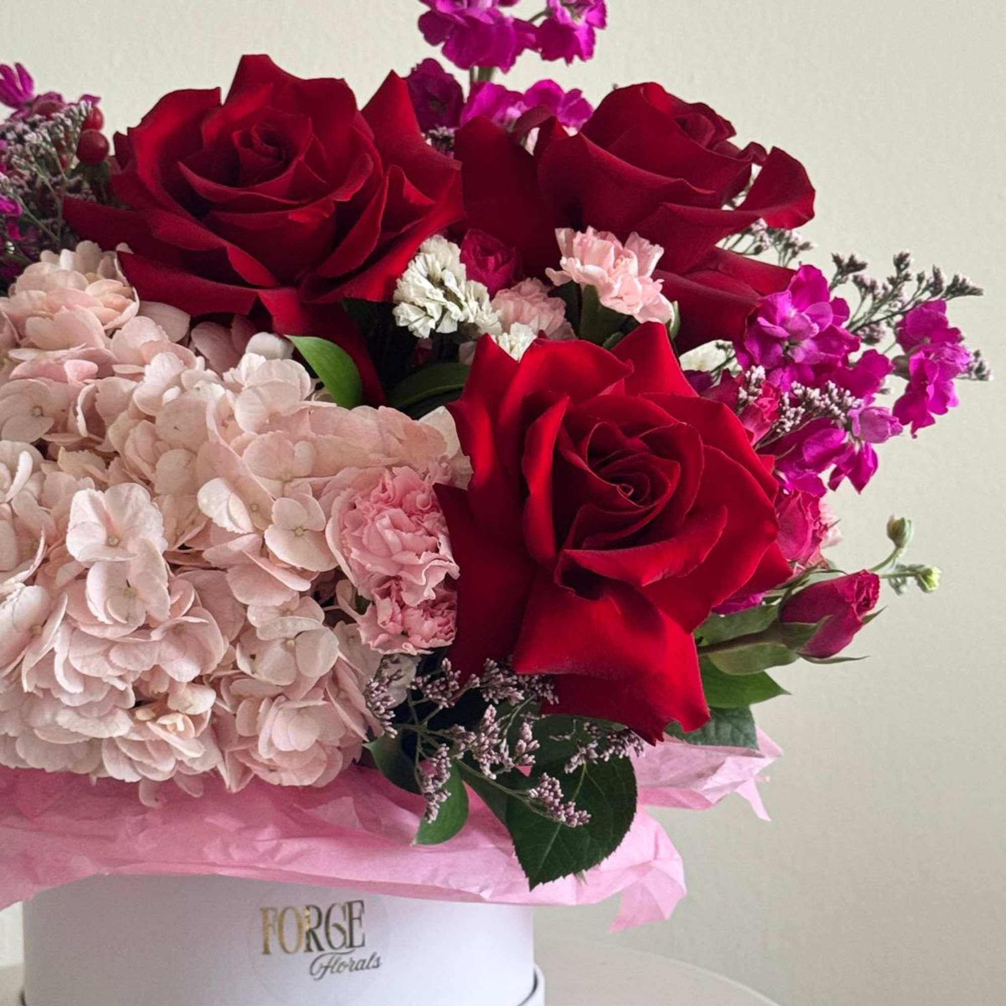 mix of red,light pink and hot pink flowers. Can never go wrong, photo 2 of 3