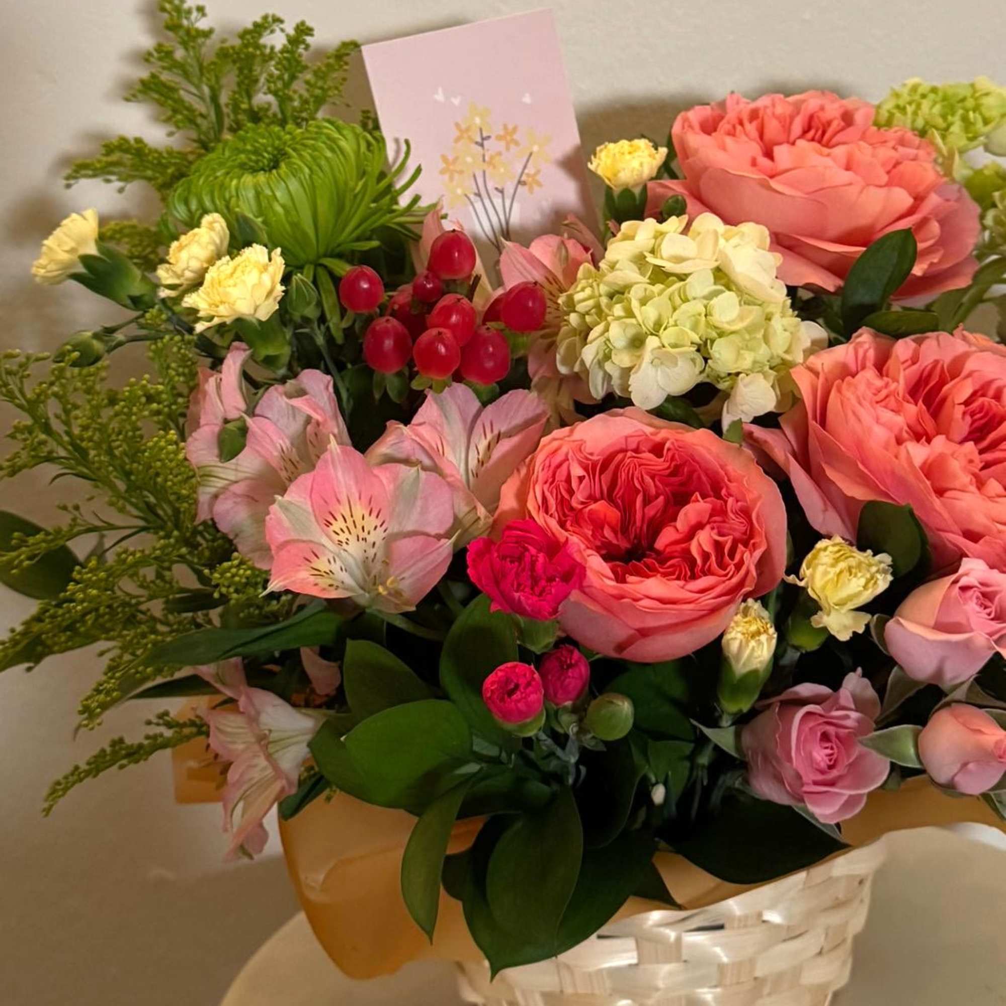 Bright mx of flowers in a basket. Garden rose, Chrysanthemum, Solidago, Hydrangea., photo 2 of 2