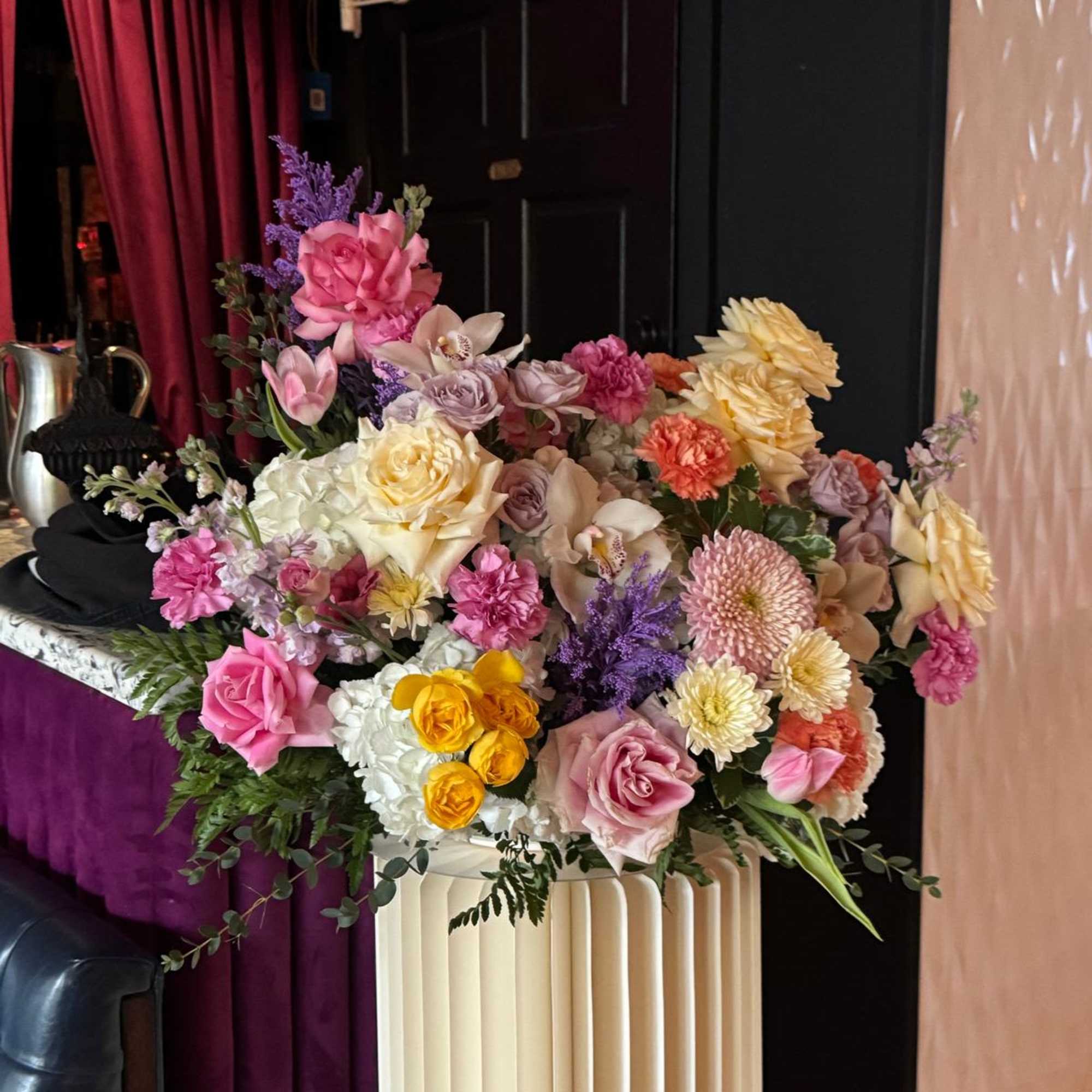 Pastel color centerpiece. Perfect or any occasion. Pedestals not included. Price for