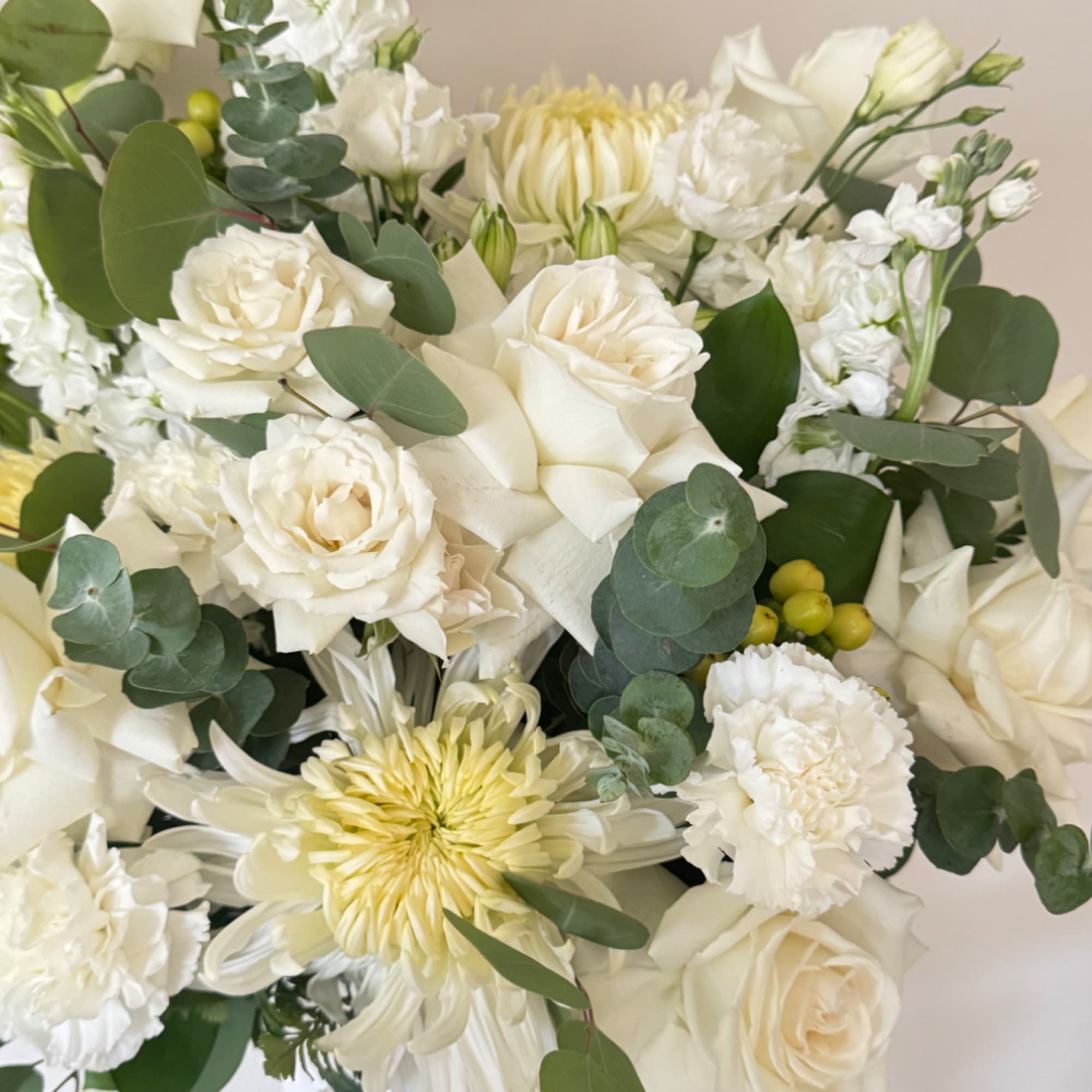 White rose and chrysanthemum bouquet with eucalyptus greenery
