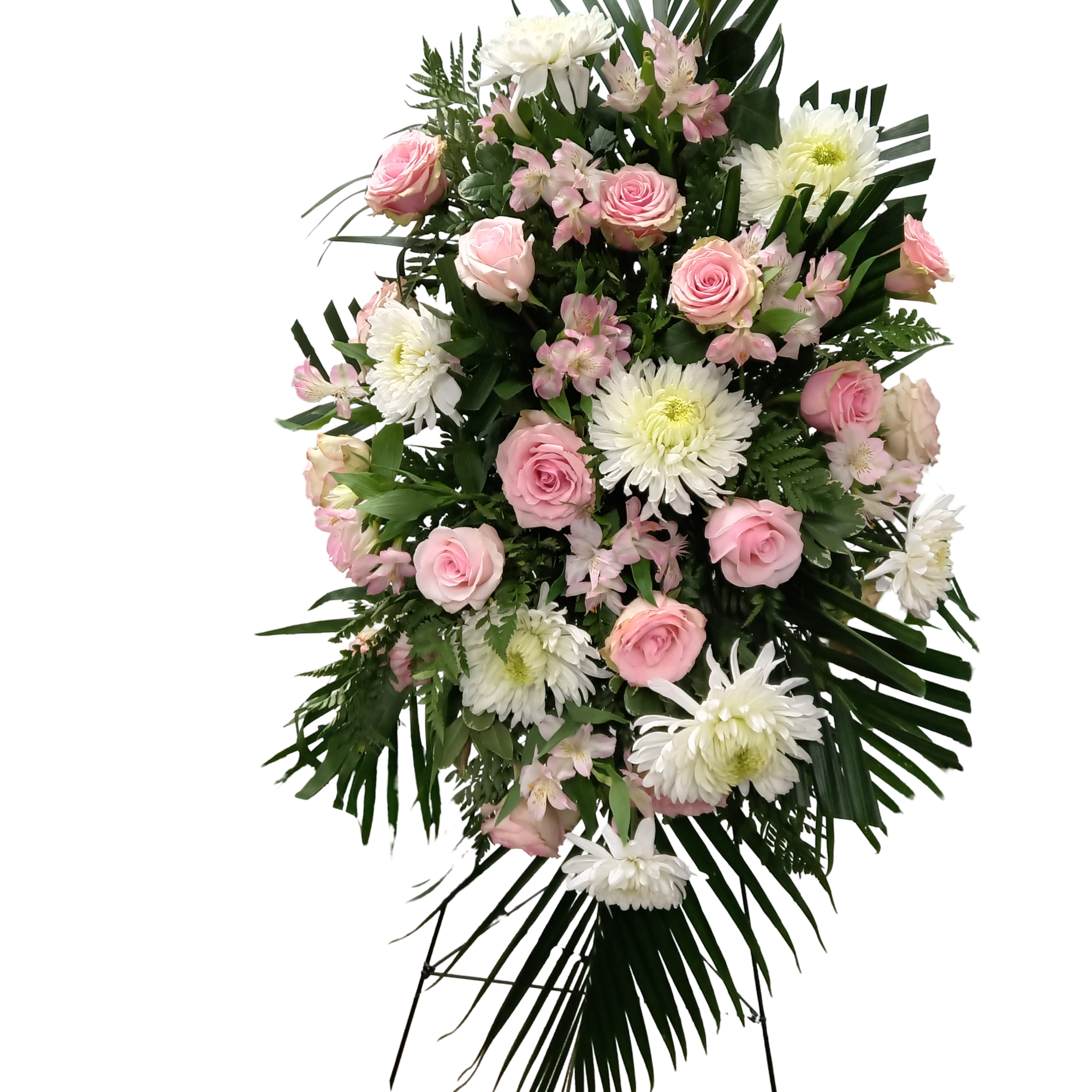 A sweet tribute for your loved one with mums, stock and roses.