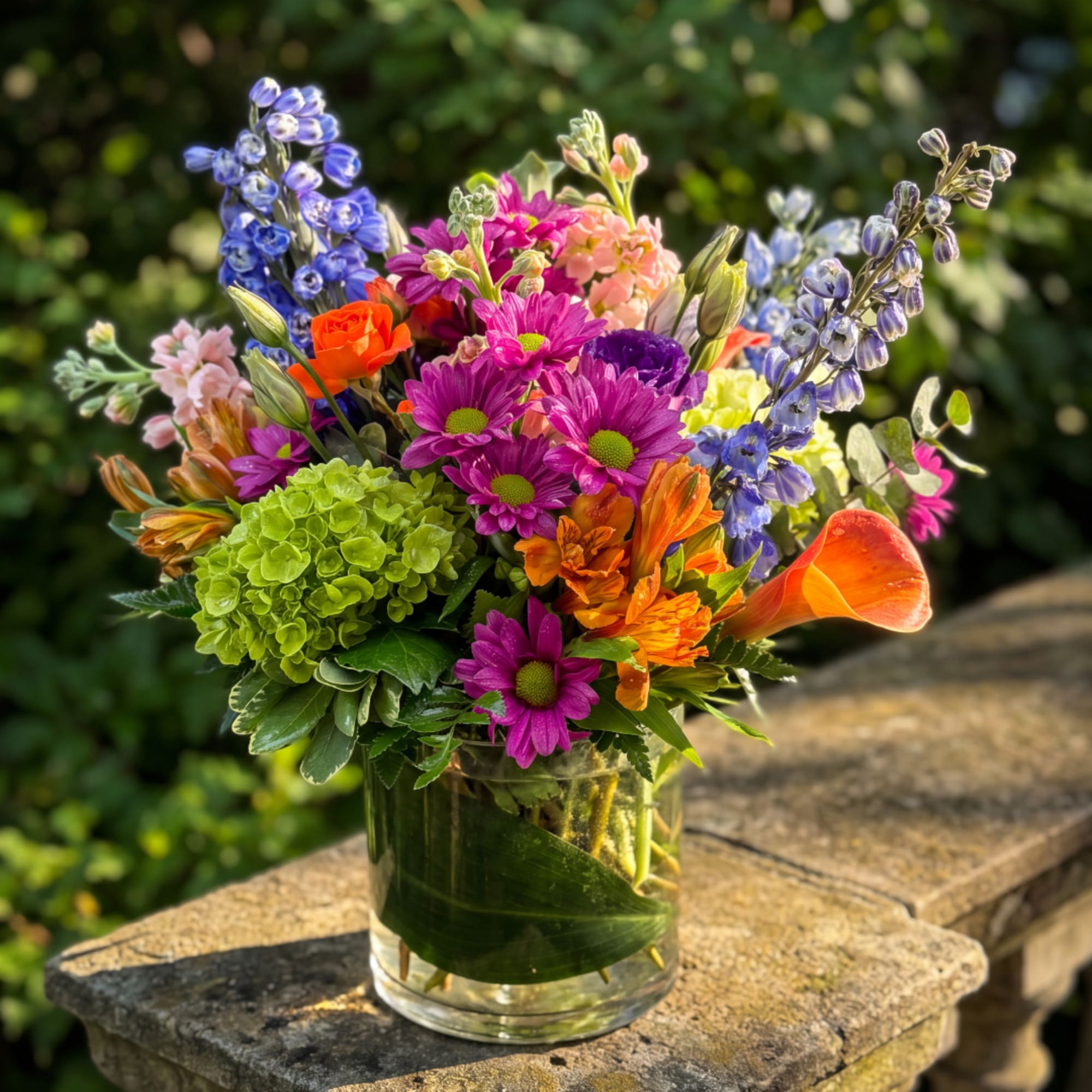 Colorful mixed bouquet in a clear glass vase