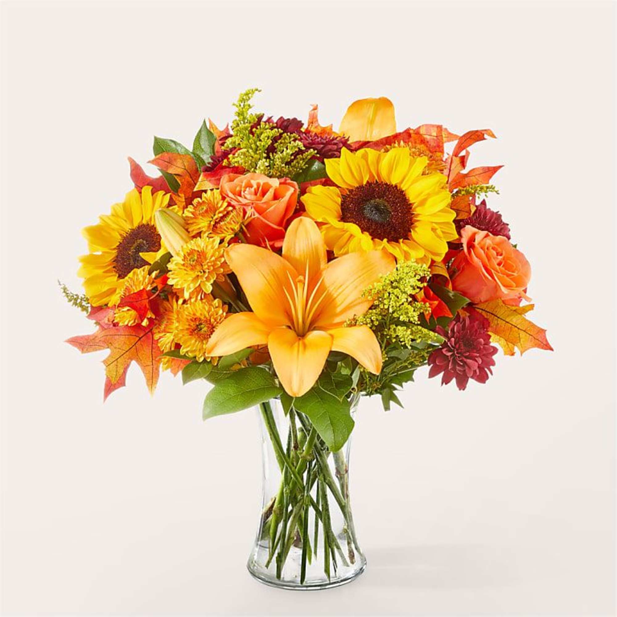 Brighten any moment with the Golden Horizon Bouquet, a radiant mix of