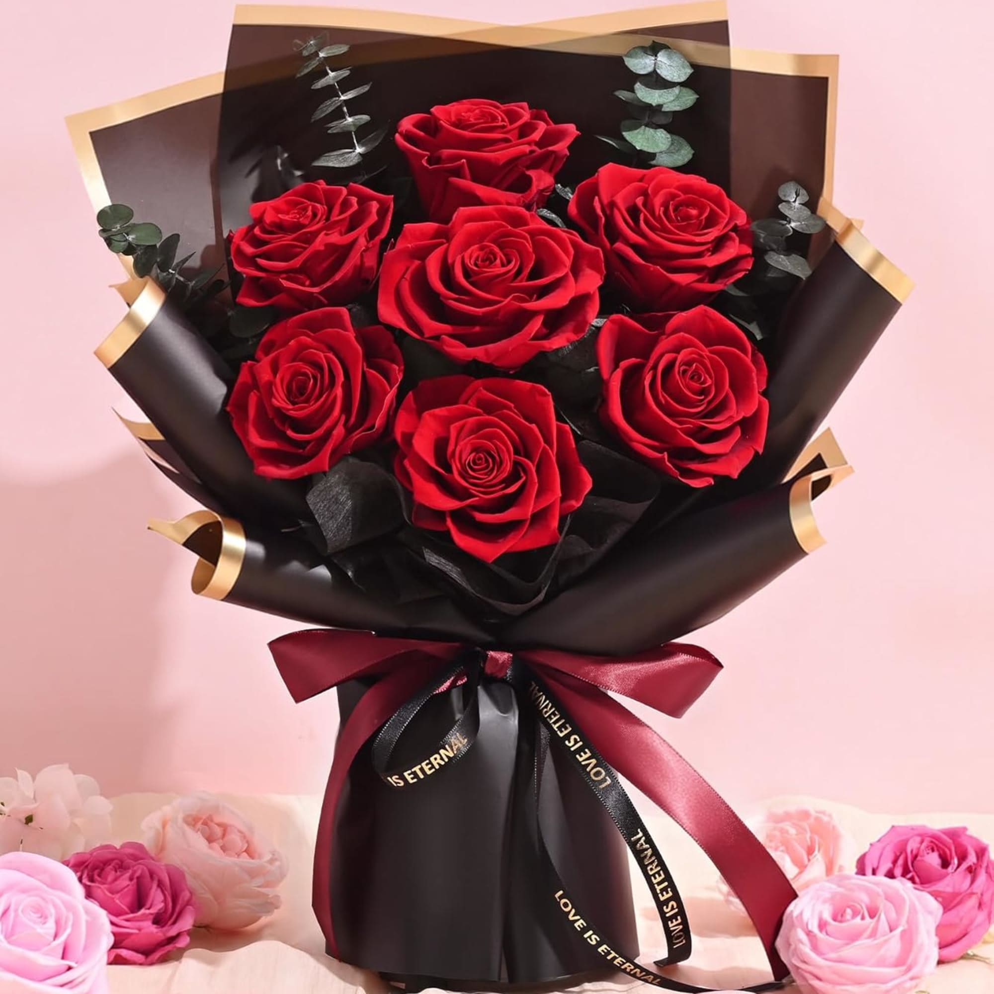 Bouquet of red roses wrapped in black paper with a burgundy ribbon, photo 4 of 4