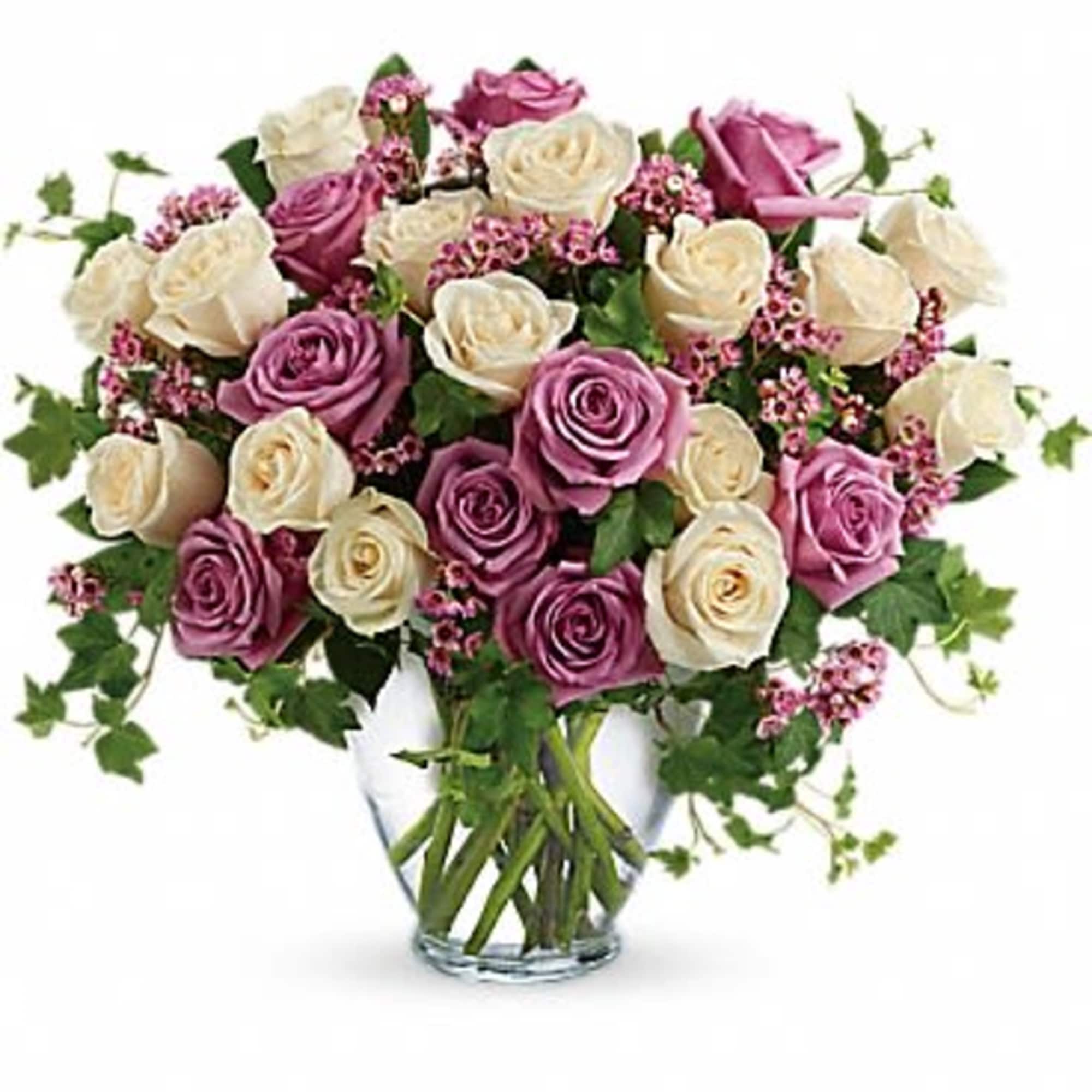 Romance blossoms beautifully within this elegant bouquet. The serenity and innocence of