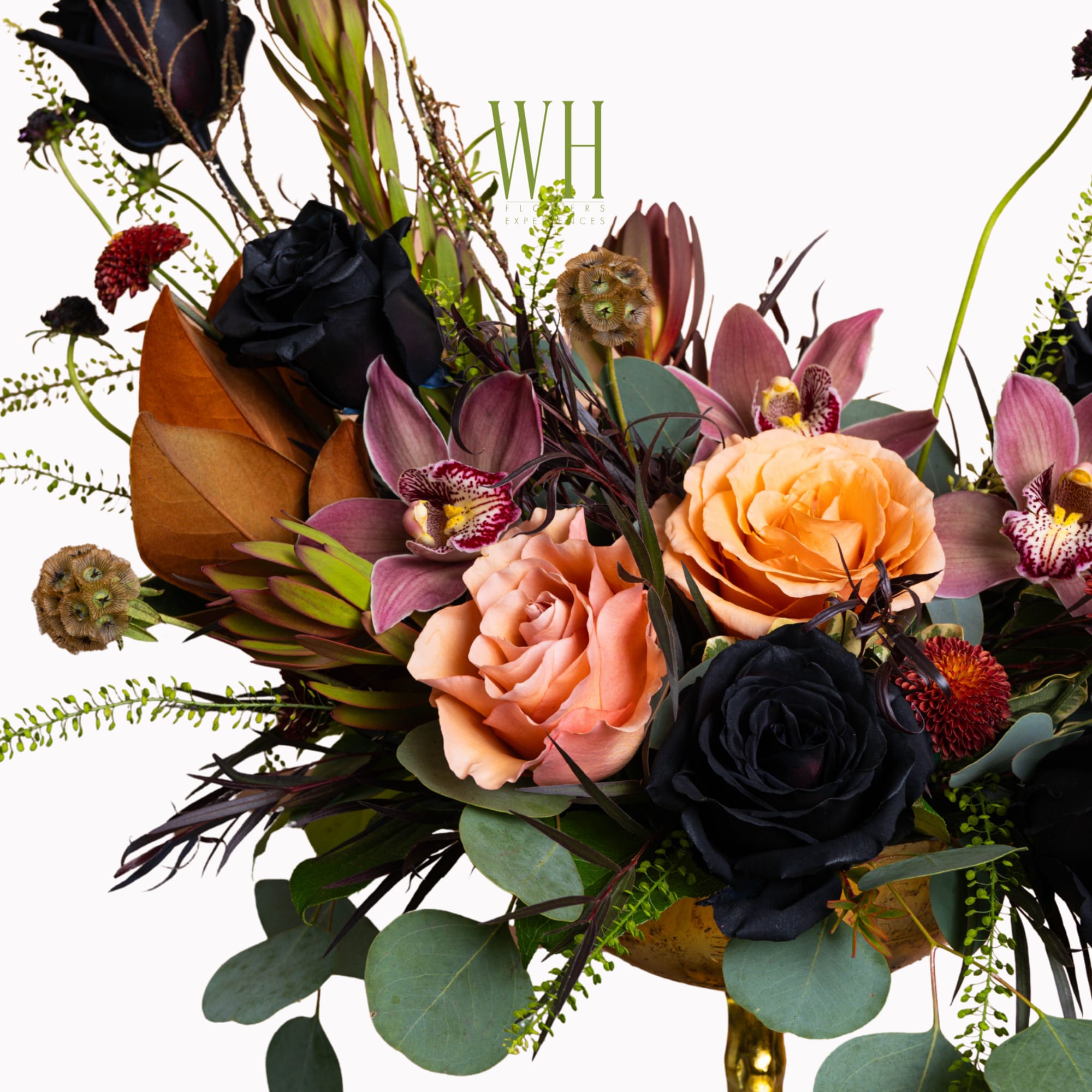 Bouquet of peach and black roses with purple orchids